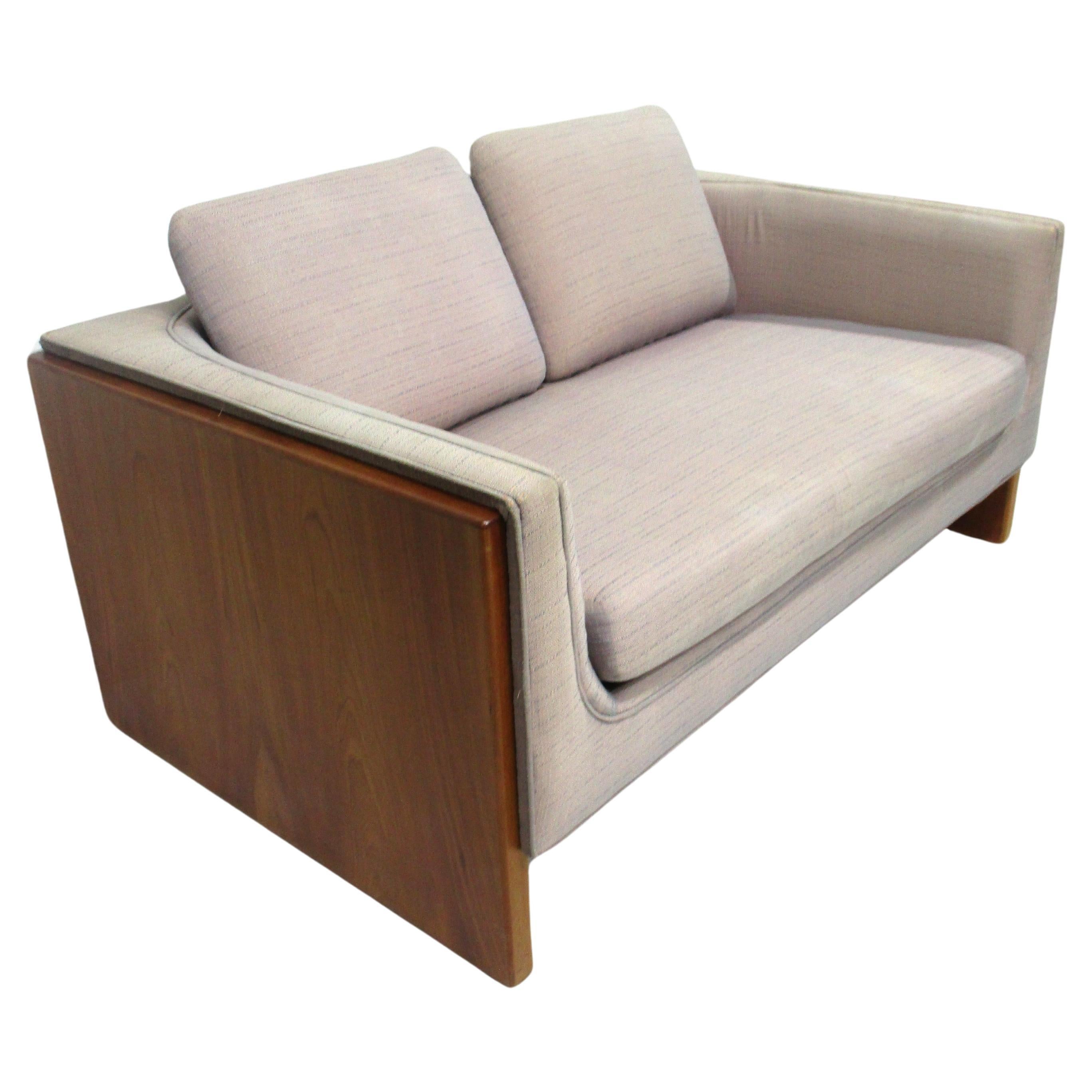 Mid Century Walnut Upholstered Loveseat in the style of Milo Baughman  For Sale