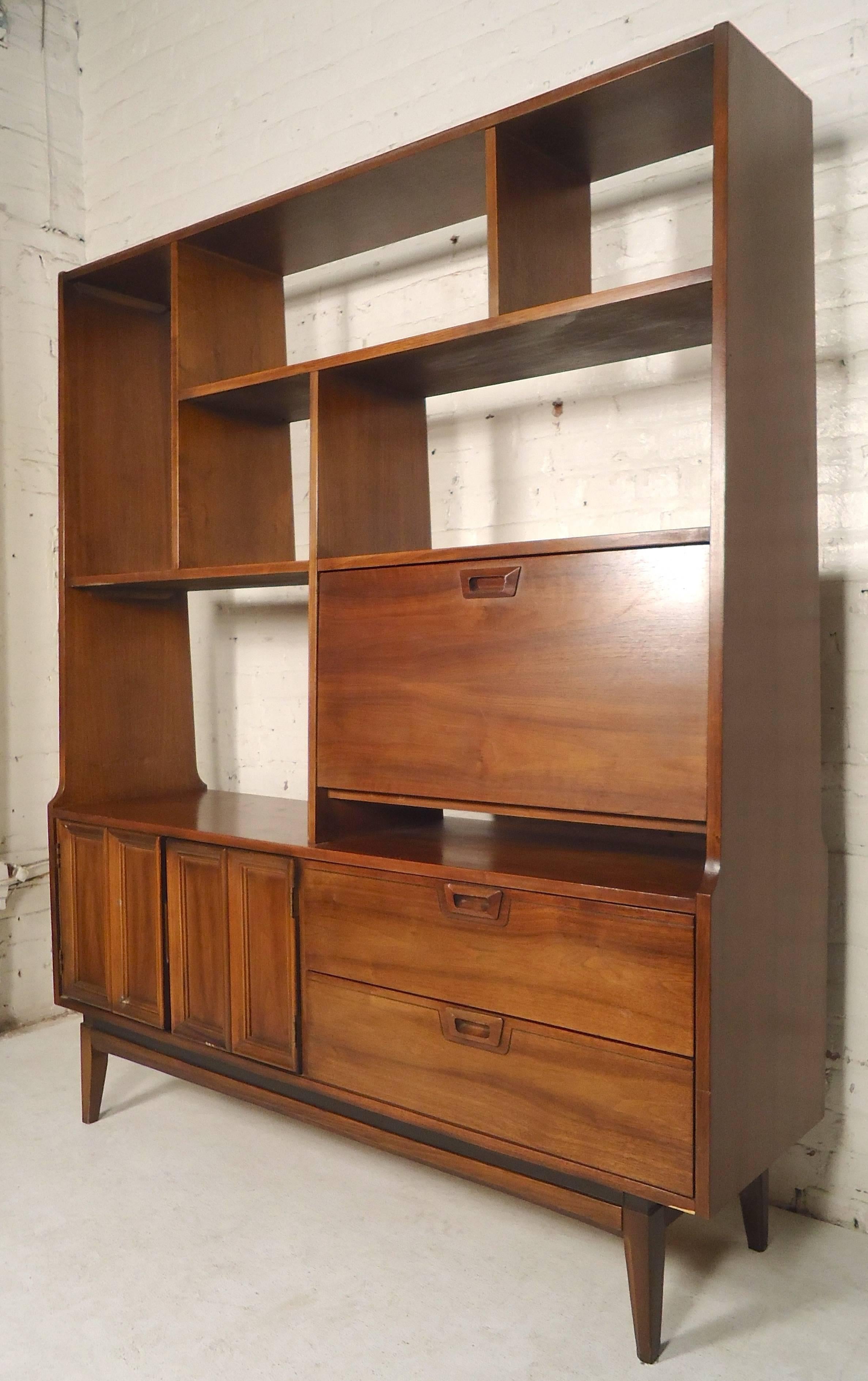 Vintage standing bookcase with various storage compartments, and a finished back for placement anywhere in the room.

(Please confirm item location - NY or NJ - with dealer).
        