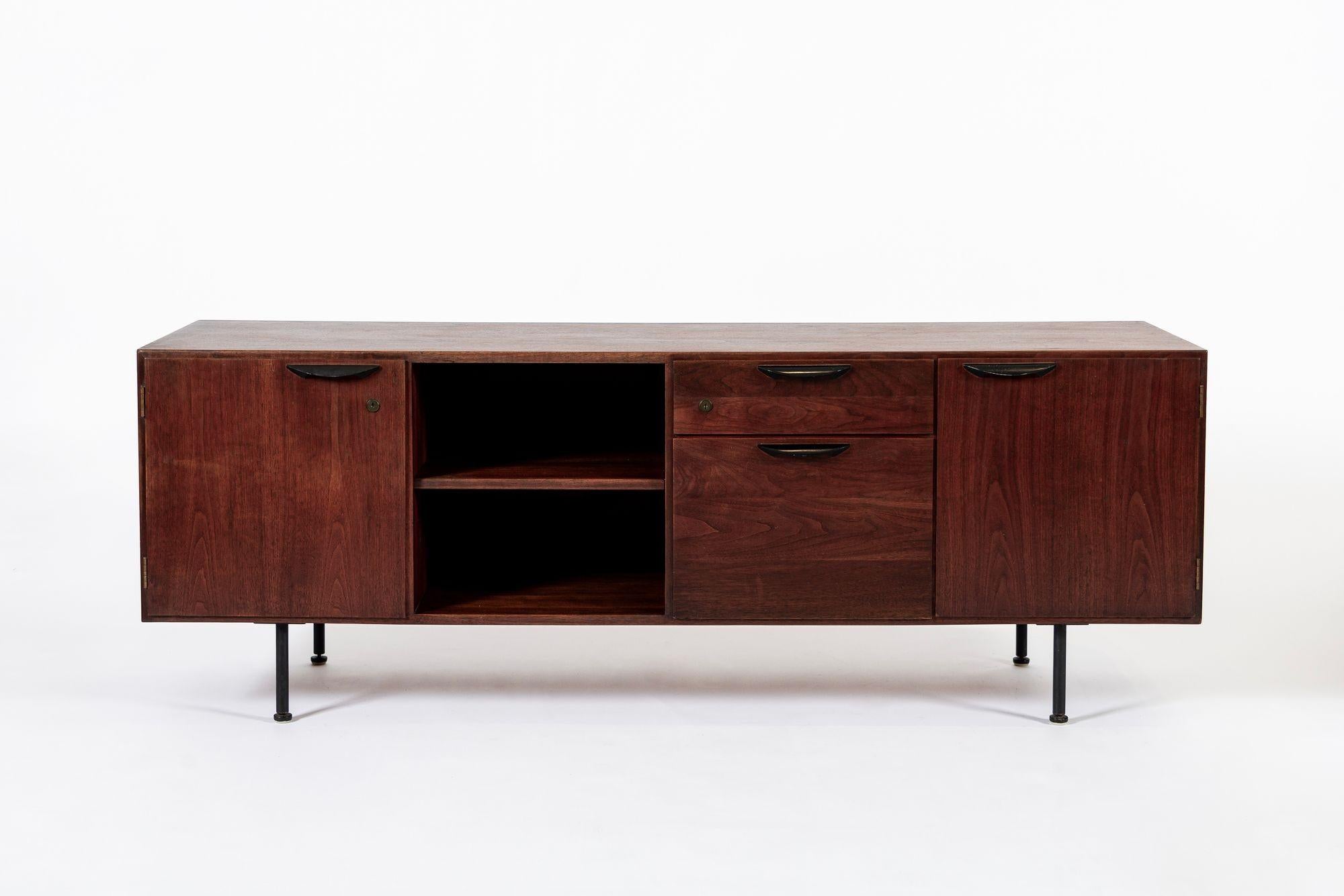 This vintage mid century file cabinet credenza from the Group 8 Collection designed by Jens Risom circa 1960 has classic Danish modern styling with clean, minimalist, geometric lines. The Group 8 series was originally made-to-order and highly