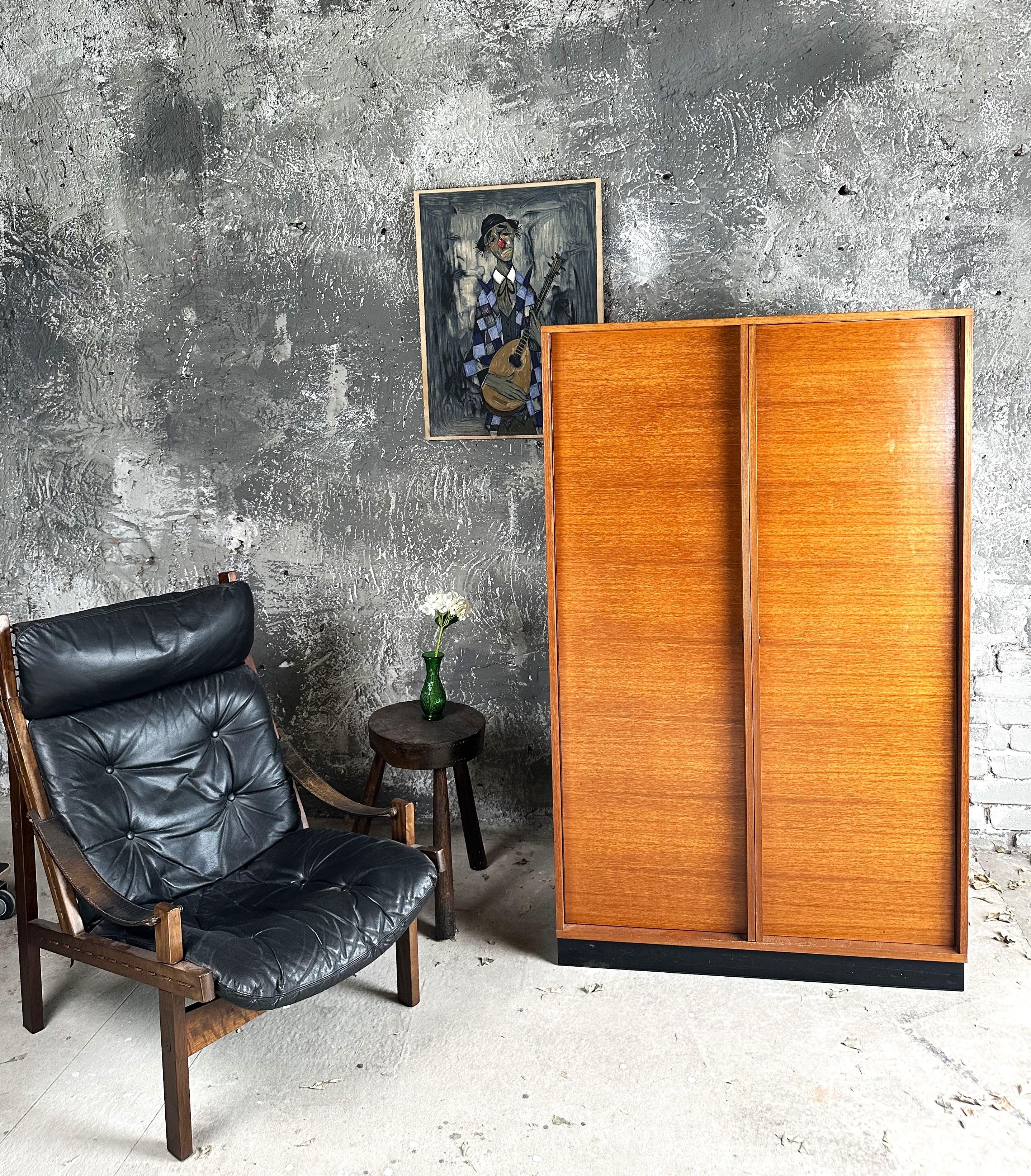 Mid-Century Wardrobe Danish Teak.

Günther Renkel for Rego Moebel, Göttingen Germany, 1960s.

perfect vintage condition. shelves and coat hanger.

matching low board also on stock.