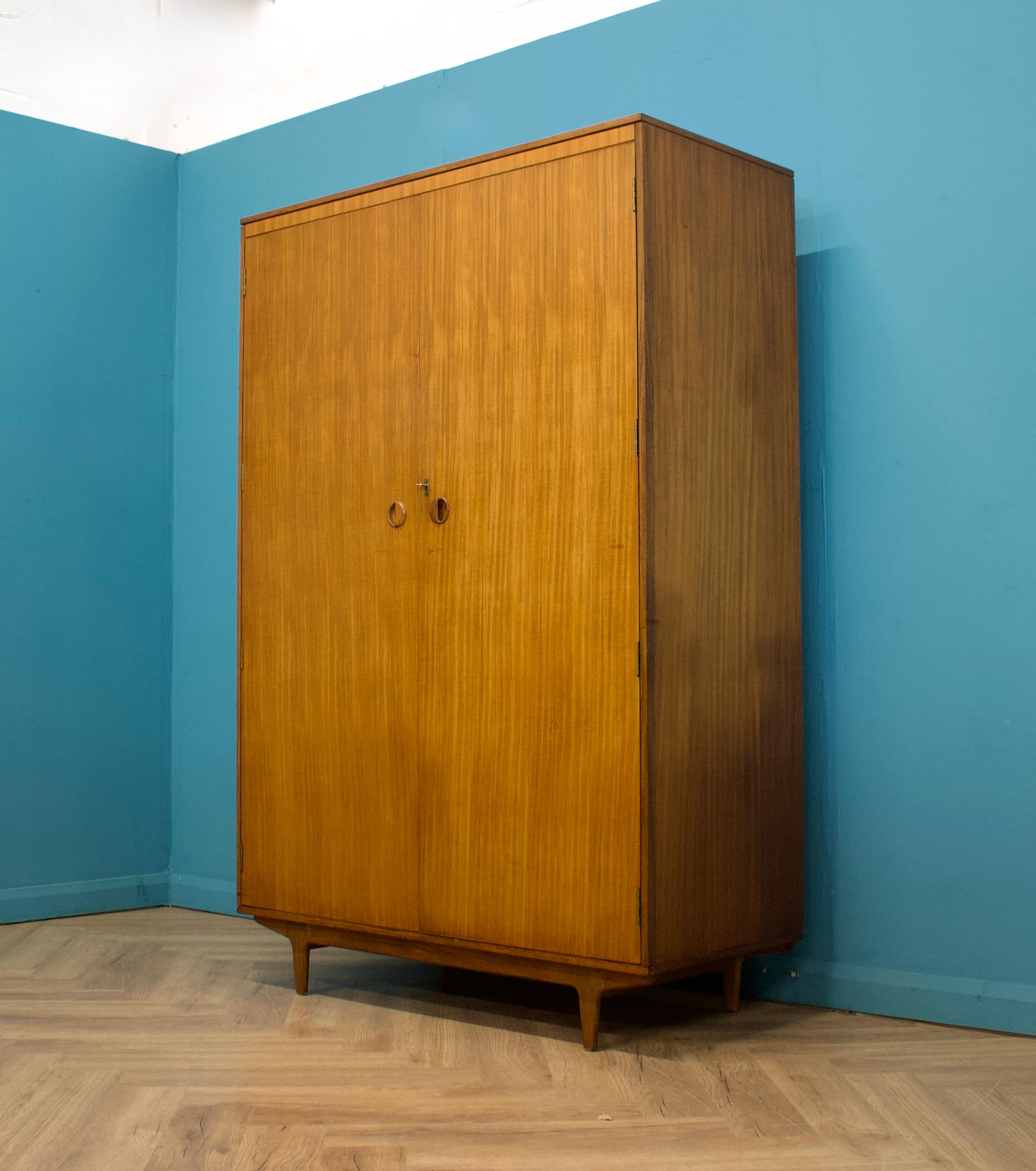 British Mid-Century Wardrobe in Teak from Butilux, 1960s For Sale