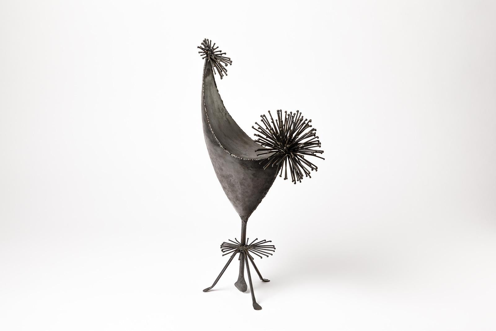 Nicole and Michel Anasse

Mid-century black welded iron bird sculpture.

Realised circa 1950.

Elegant and decorative art piece with original black color.

Heigth : 44cm Large : 23cm Depth : 14cm