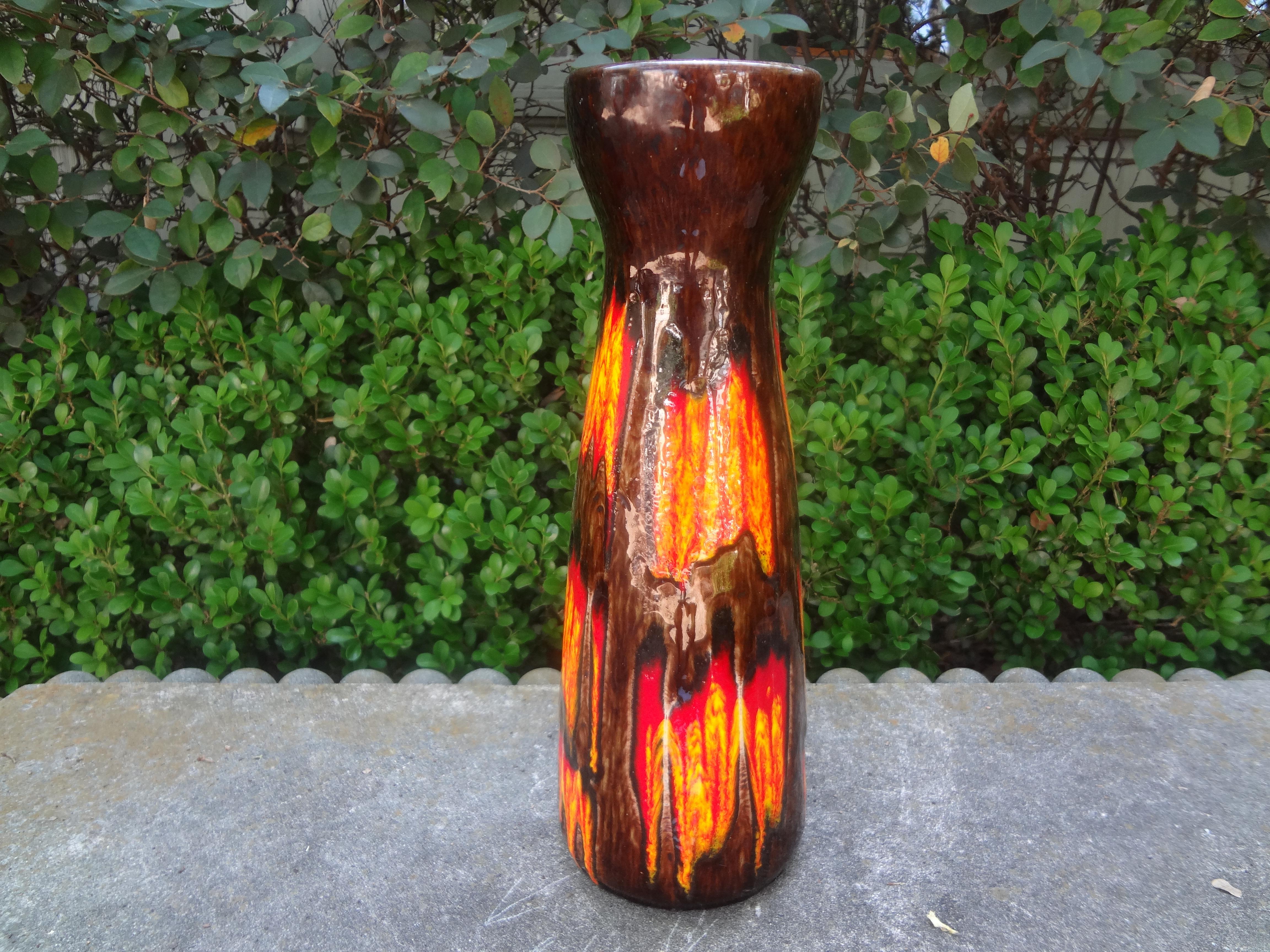 Mid Century West German Glazed Pottery Vase.
 This handsome West German glazed pottery vase has the most interesting flame design with beautiful colors. Just one of our large collection!