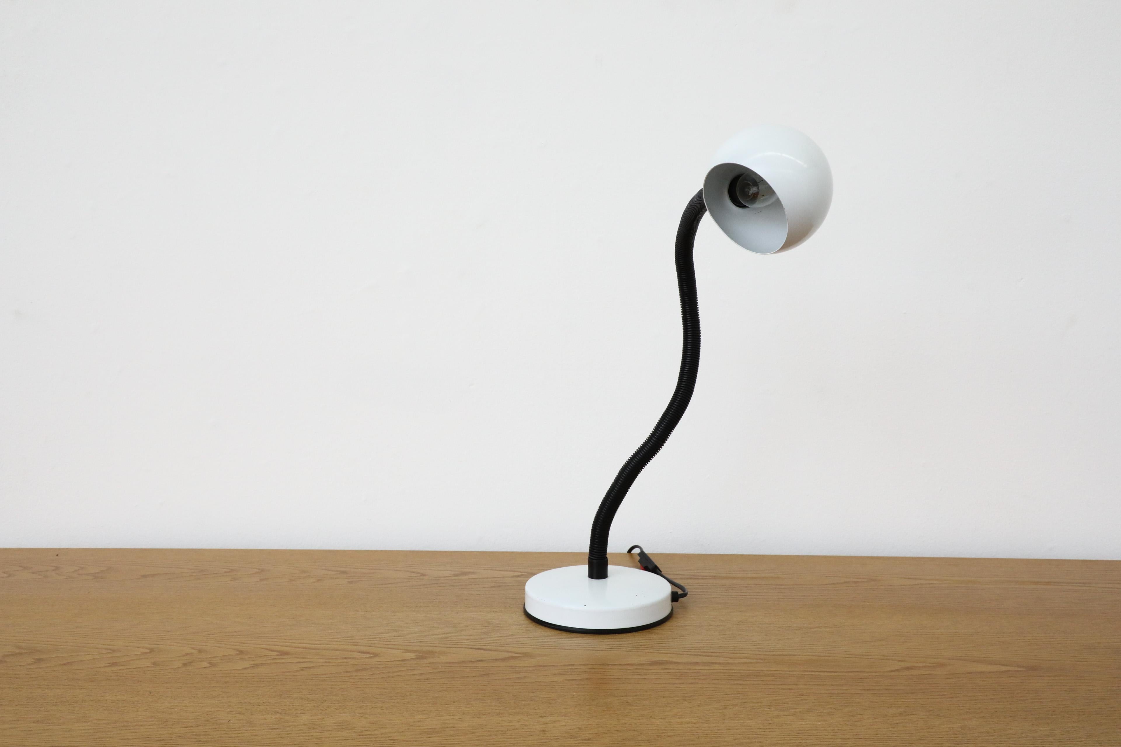 Mid-Century White Gooseneck Globe Desk Lamp with Posable Black Stem In Good Condition For Sale In Los Angeles, CA