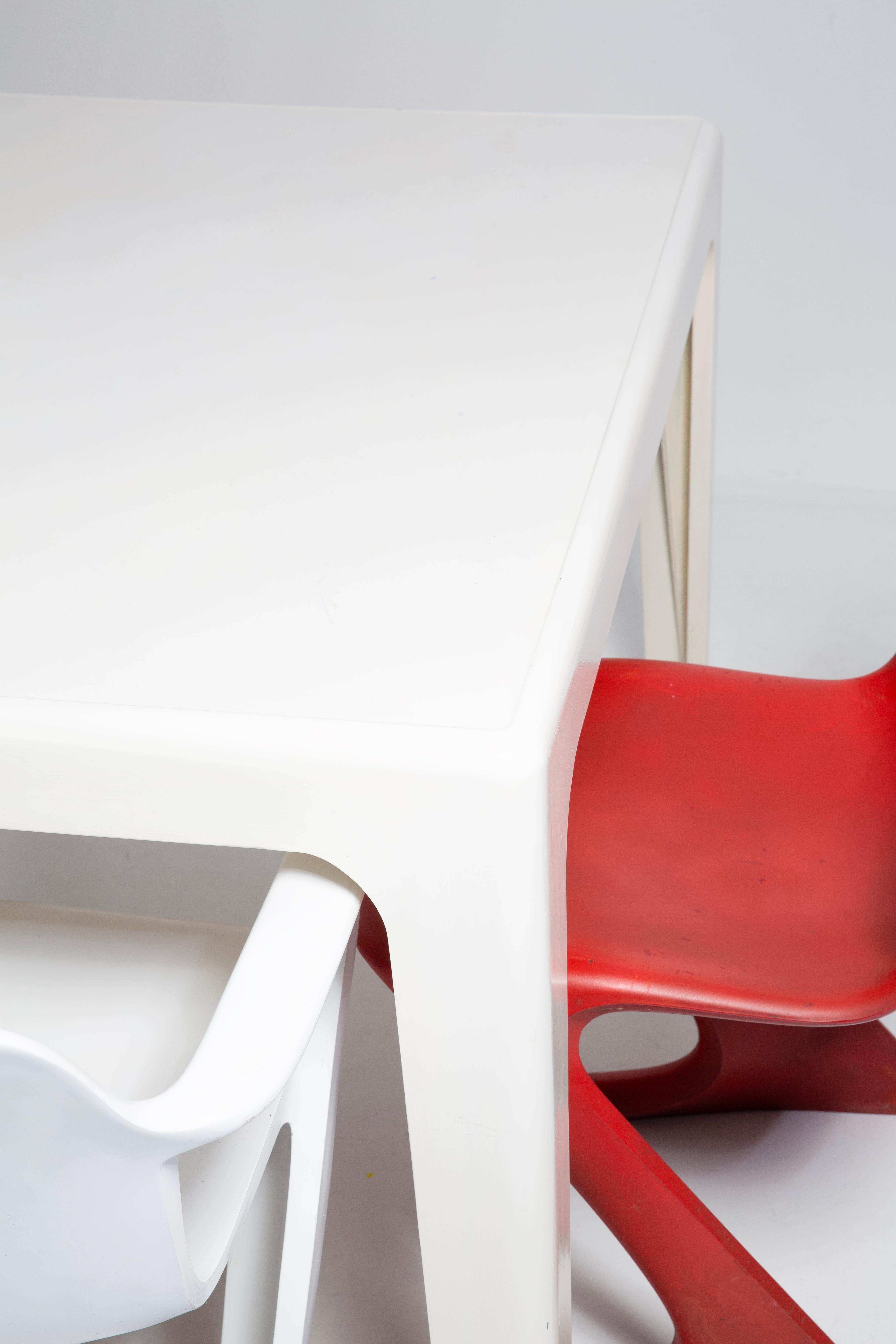 Lacquered Mid Century White Kangaroo Dining Table, by Ernst Moeckl, Germany, 1968 For Sale