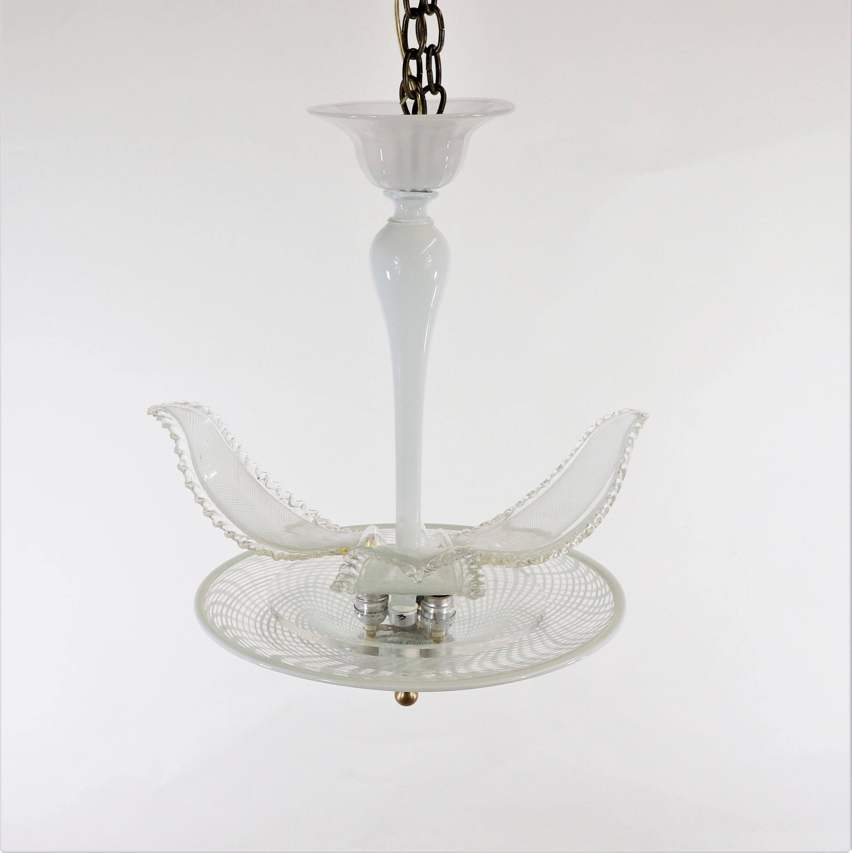 This delicately handcrafted mid-century latticino Murano light is adorned with three beautiful glass leaves. The latticino technique refers to a type of opaque white Murano glass, often used to create decorative white ribbon or thread patterns in