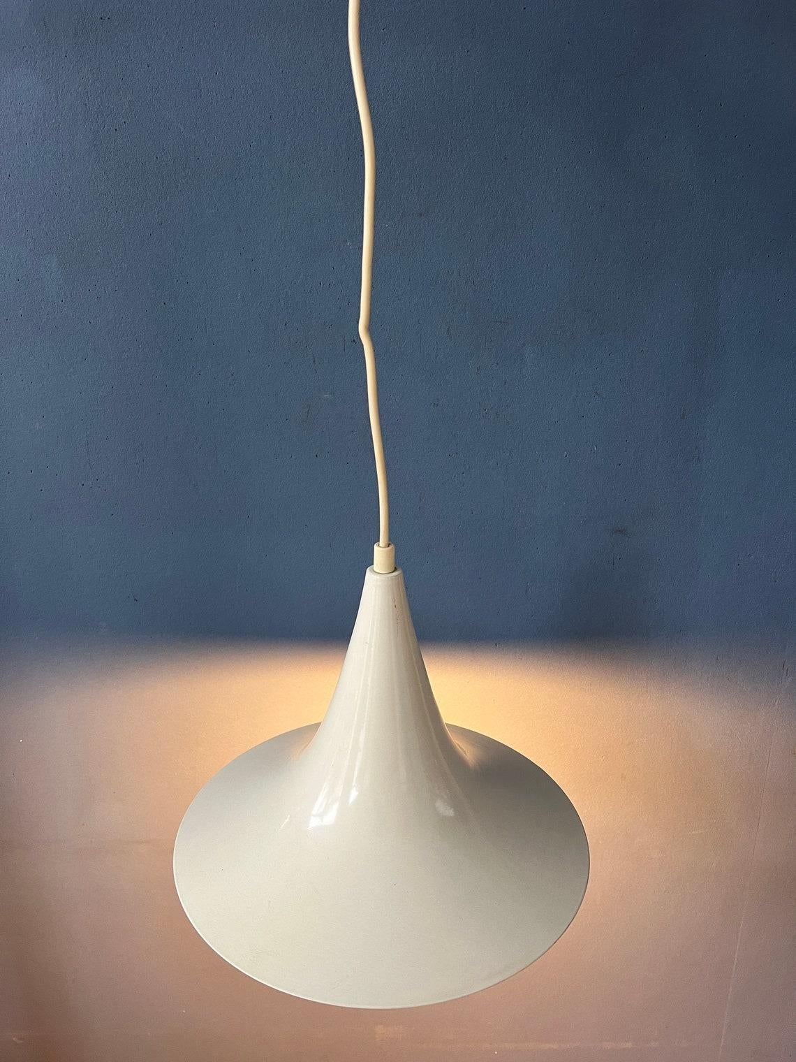 Small white mid century space age witch hat pendant lamp. The shade is made out of metal and has a white/beige lacquer. The lamp requires an E27 (E26) lightbulb.
2 pieces available

Additional information:
Materials: Plastic
Period: