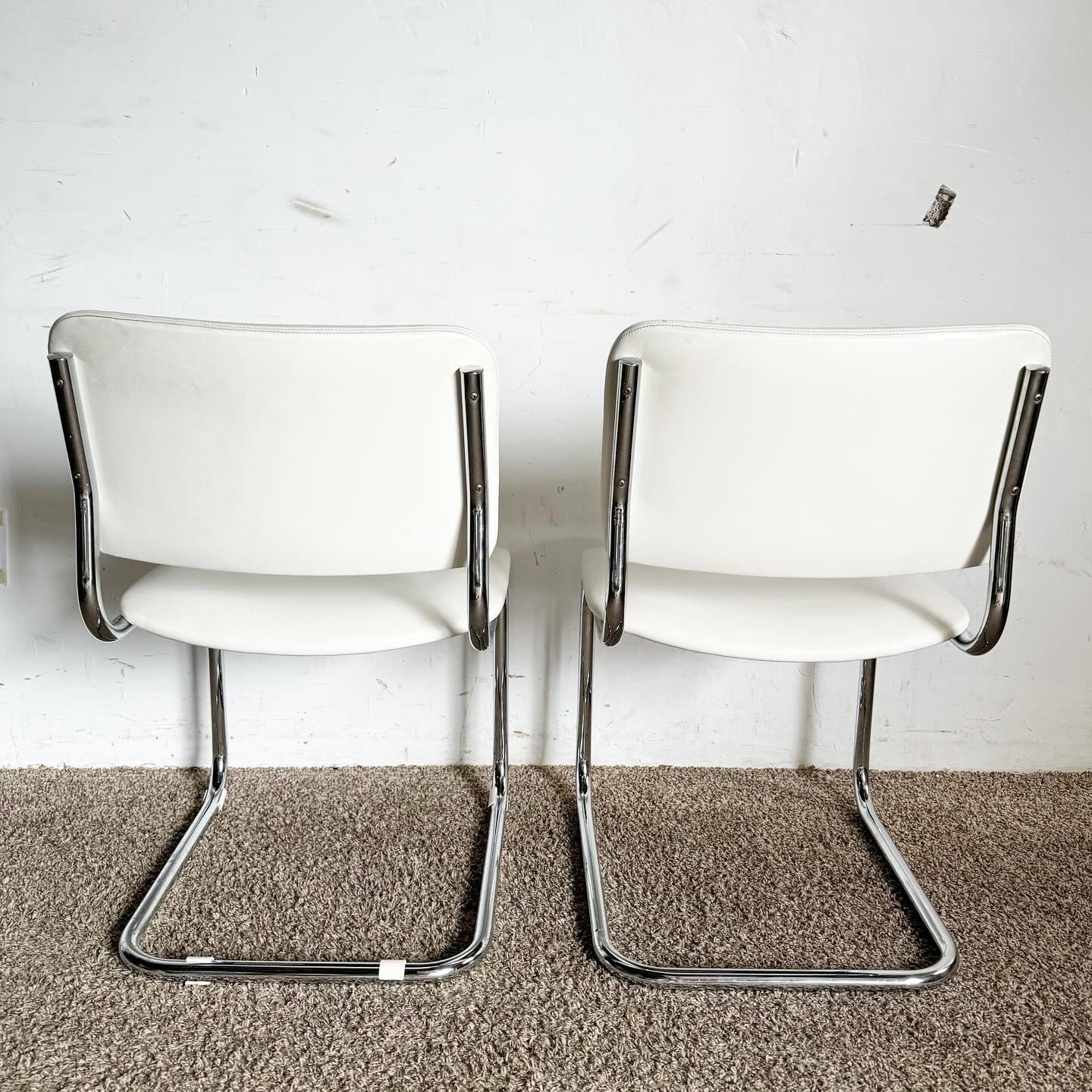 American Mid Century White Vinyl and Chrome Cantilever Dining Chairs by Loewenstein/Oggo For Sale