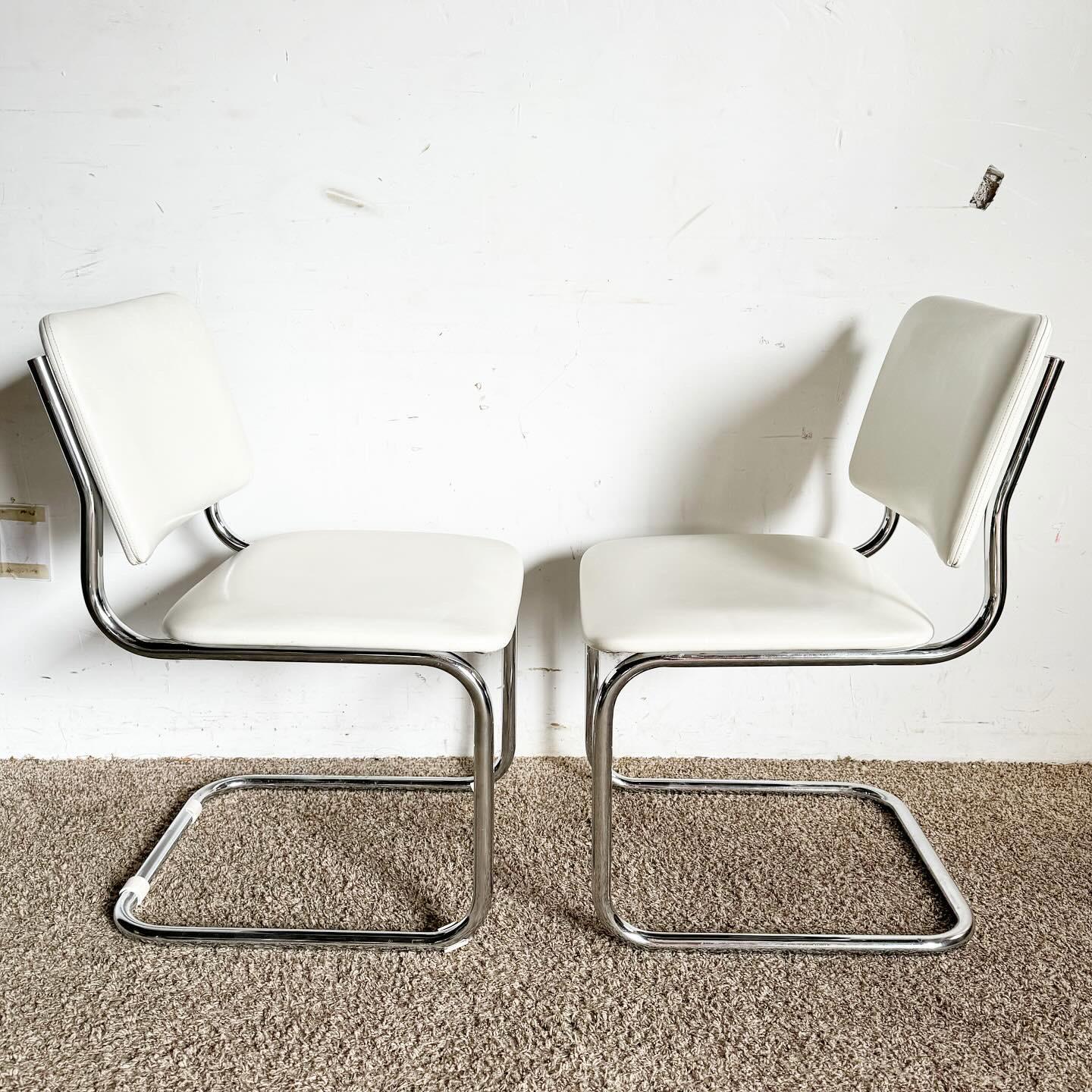 Mid Century White Vinyl and Chrome Cantilever Dining Chairs by Loewenstein/Oggo In Good Condition For Sale In Delray Beach, FL