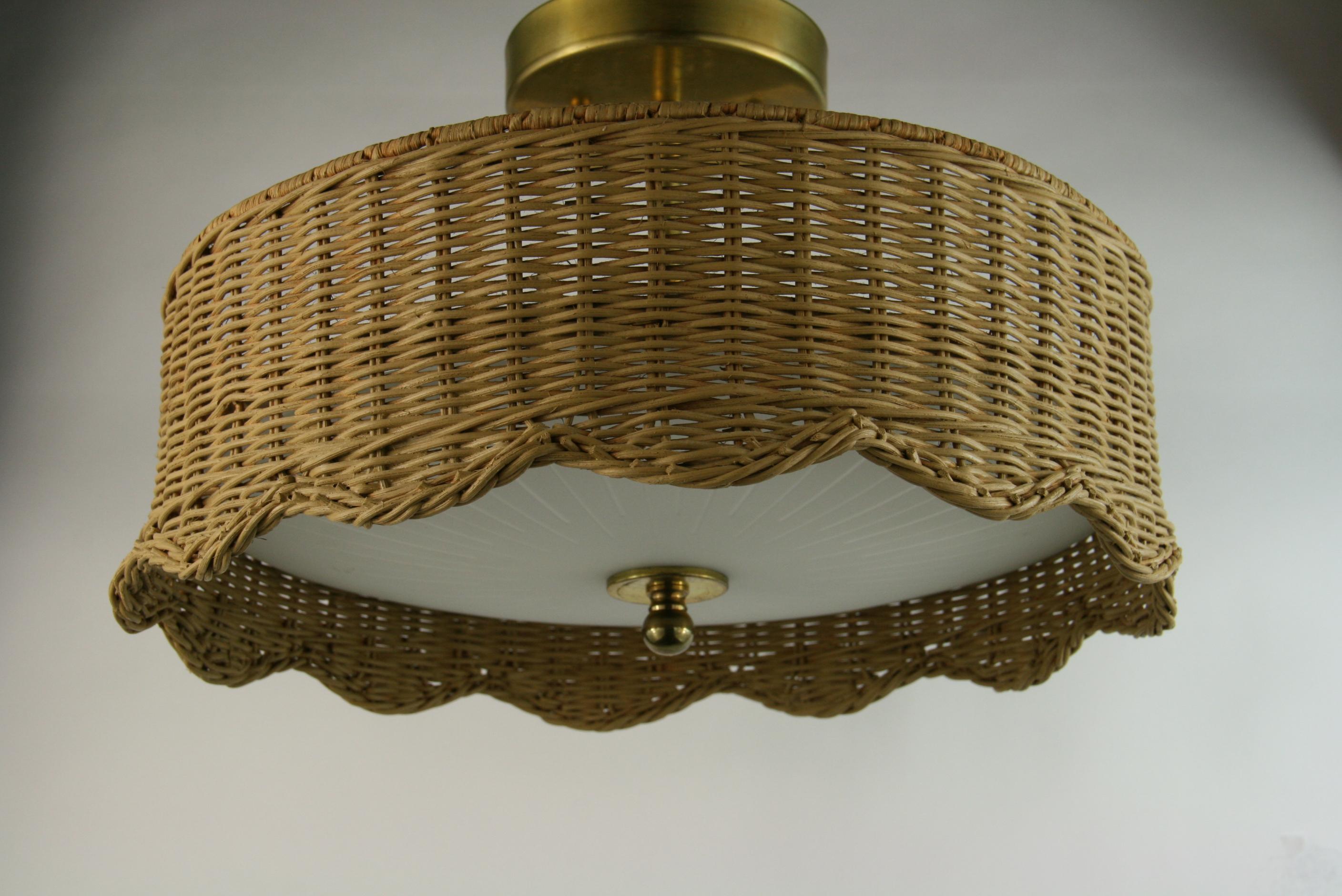 8-277 Rattan wicker and glass semi flush mount. Frosted glass with radial clear glass from center.
Takes 3 60 watt Edison based bulbs.
 