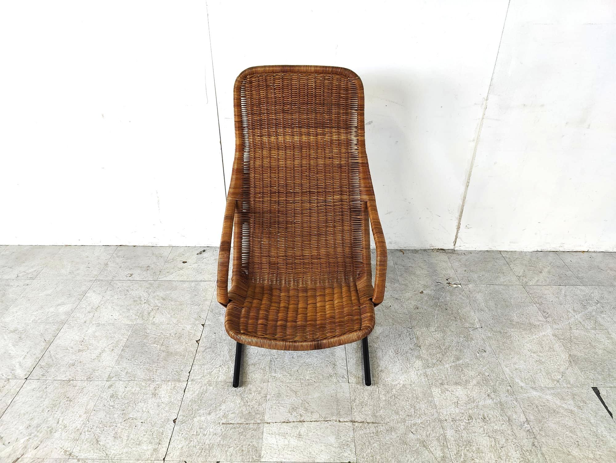 Mid century armchair with black steel frame and wicker.

Netherlands - 1960s 

Good condition

Dimensions: 
Height: 103cm
Width: 58cm
Depth: 77cm
Seat  height: 35cm


Ref.: 415261
