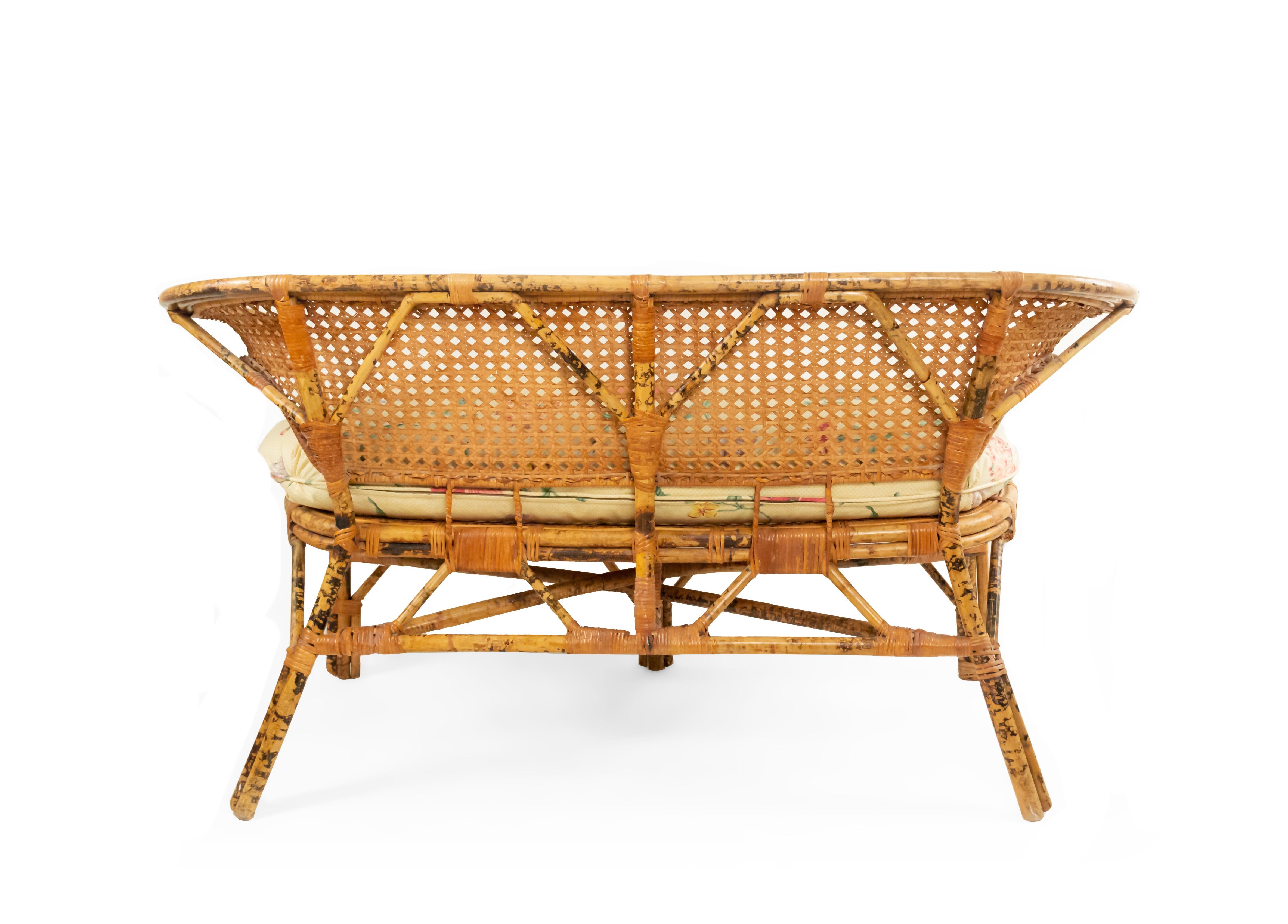 Midcentury Wicker Love Seat with Floral Upholstery In Good Condition For Sale In New York, NY