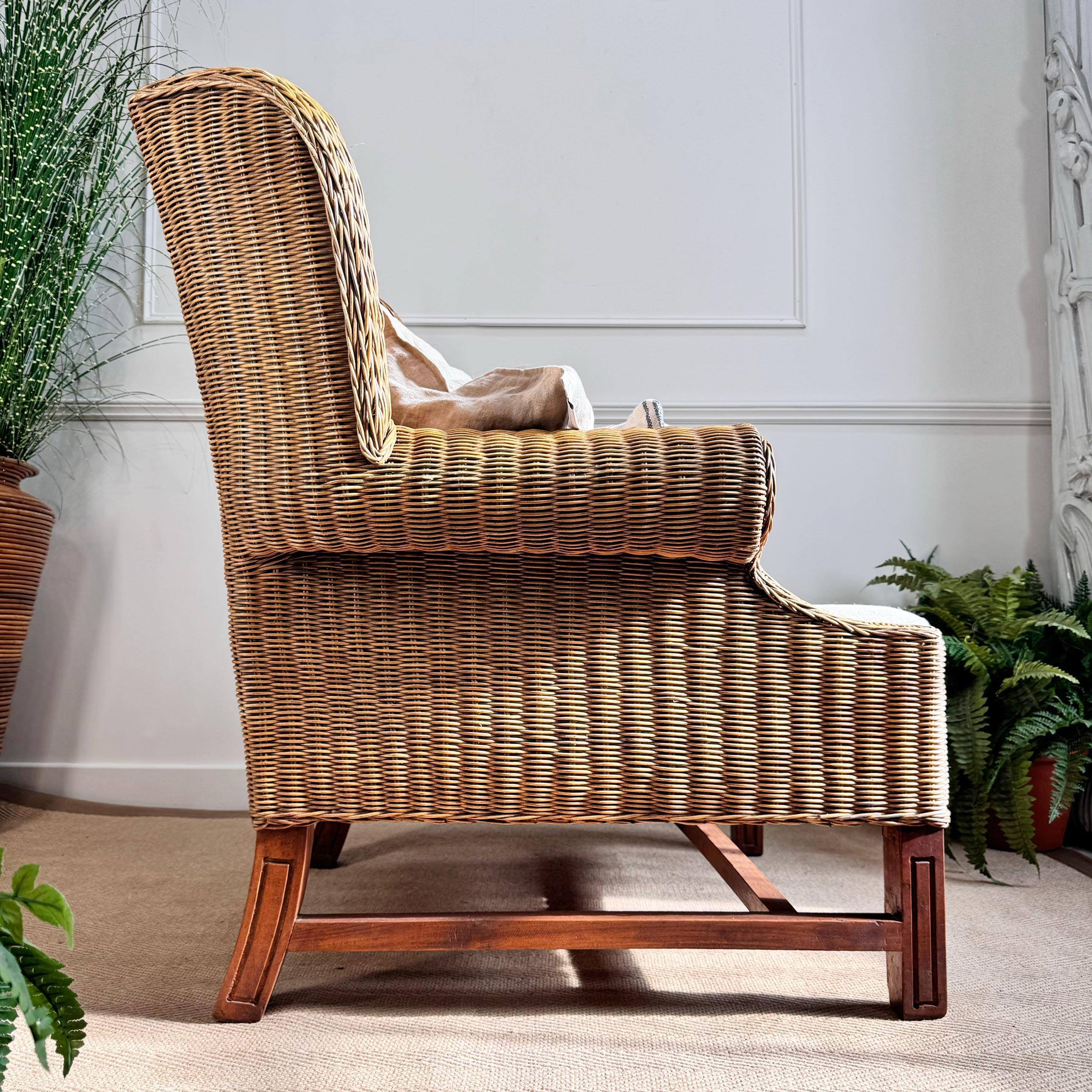 20th Century Mid Century Wicker Wing Back Armchair For Sale
