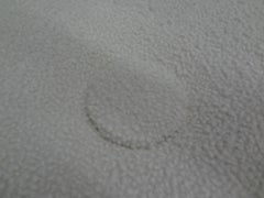 Midcentury Ottoman Pouf in the Style of William "Billy" Haines