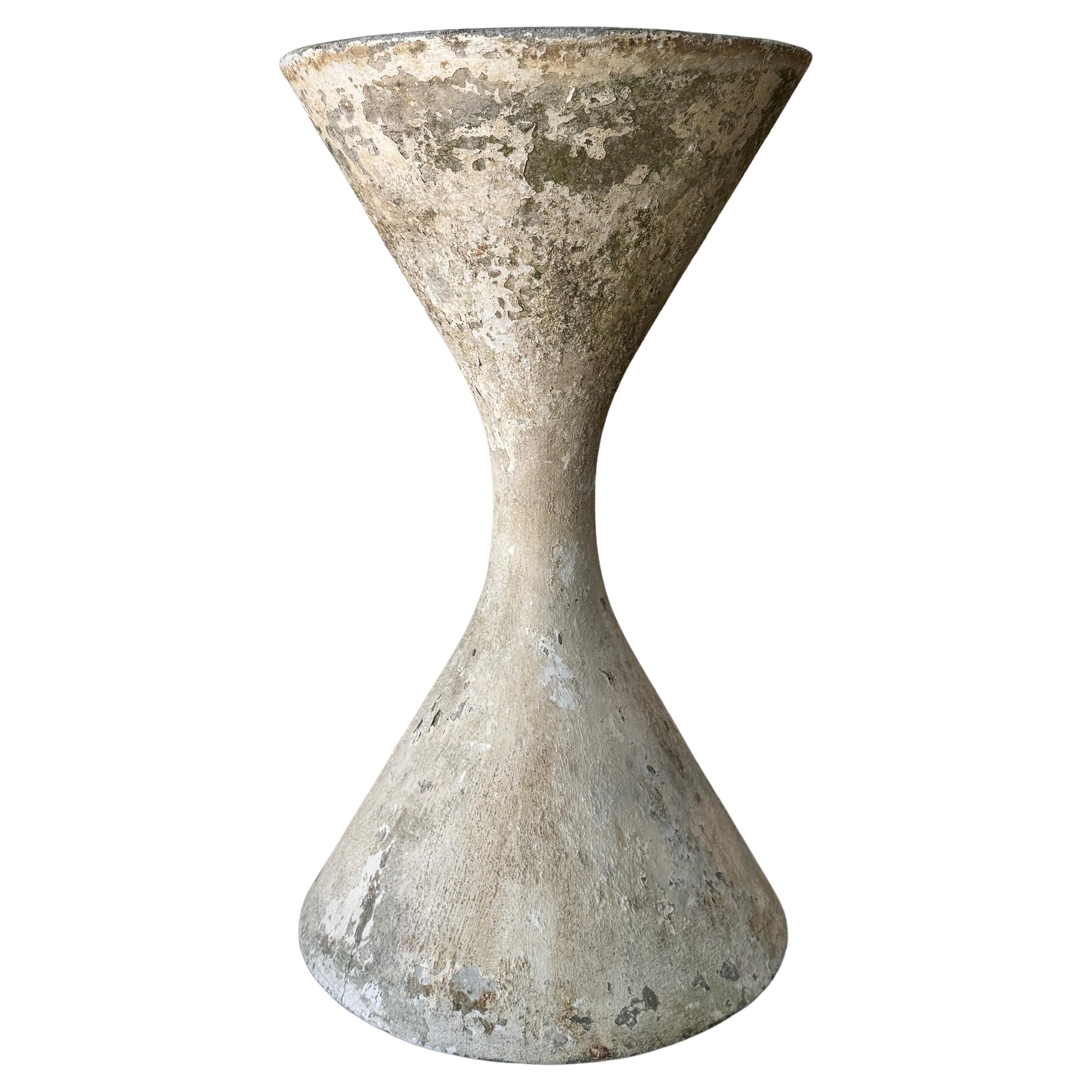Fioriera Diabolo/Classa in cemento di Willy Guhl, metà del secolo scorso