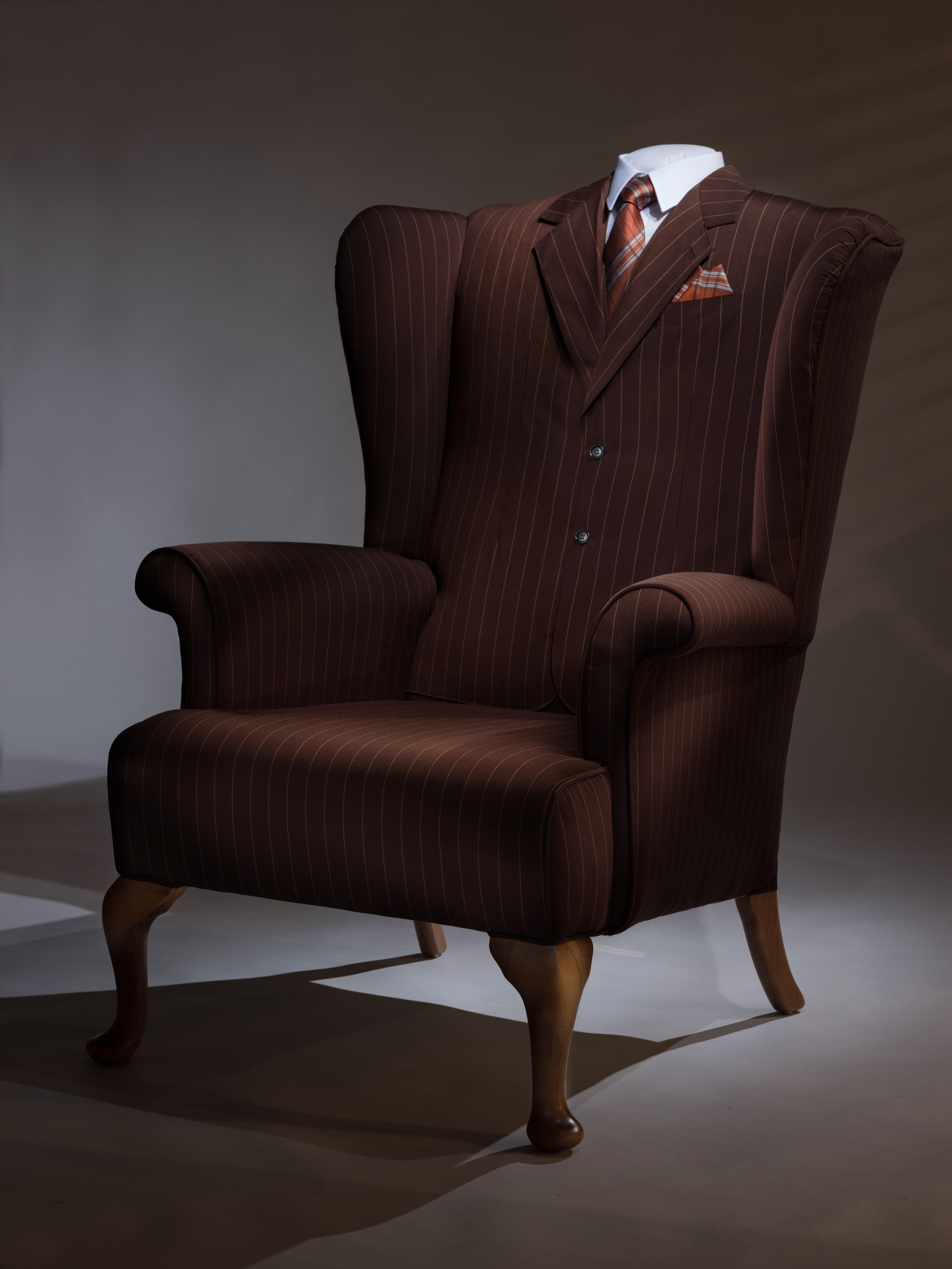 'The Great Gatsby' wing chair

Quirky mixture of an expertly tailored 'suit' form on a wing chair. We have restored a typical midcentury wing chair frame and lovingly created these one-off pieces of functional furniture art. Expertly made by our