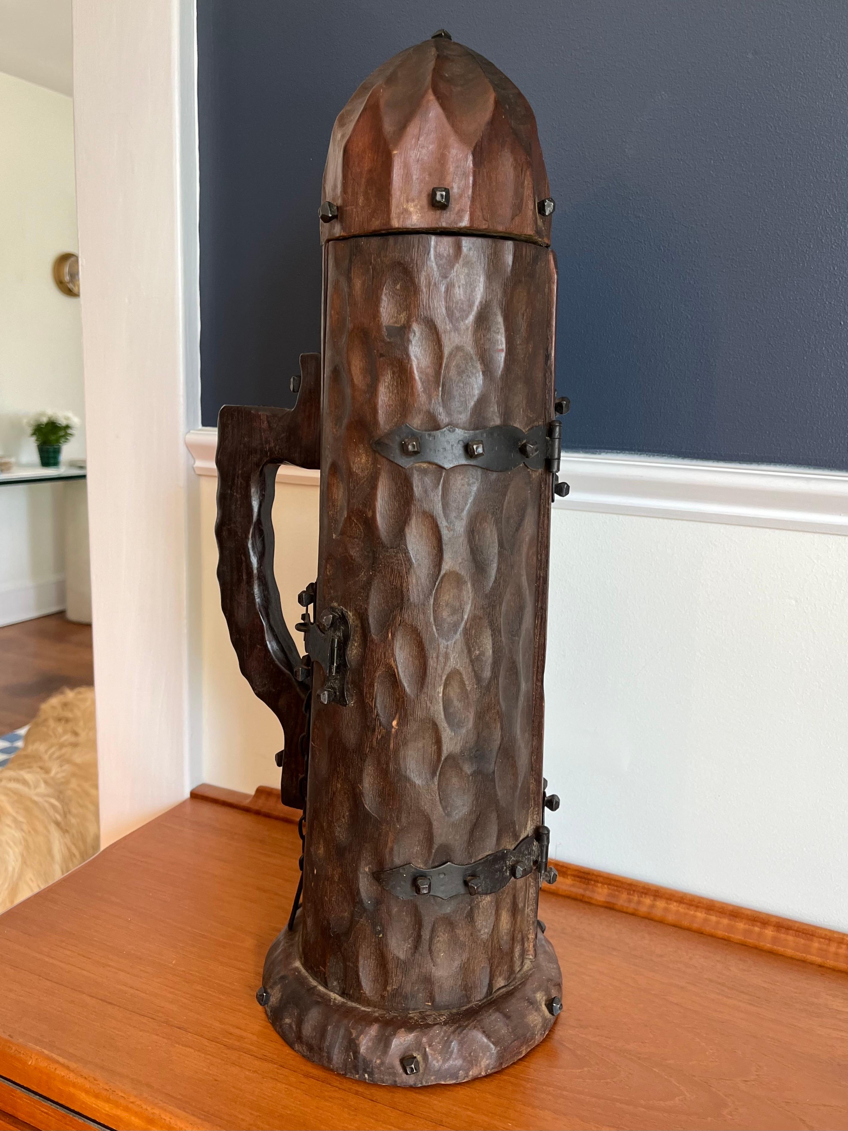 Classic mid century bottle holder in the styling of William Westenhaver for Witco. Tall and slender notched wood case with handle and metal hinge and lock. Interior is lined with period red velvet. Perfect for the collector.