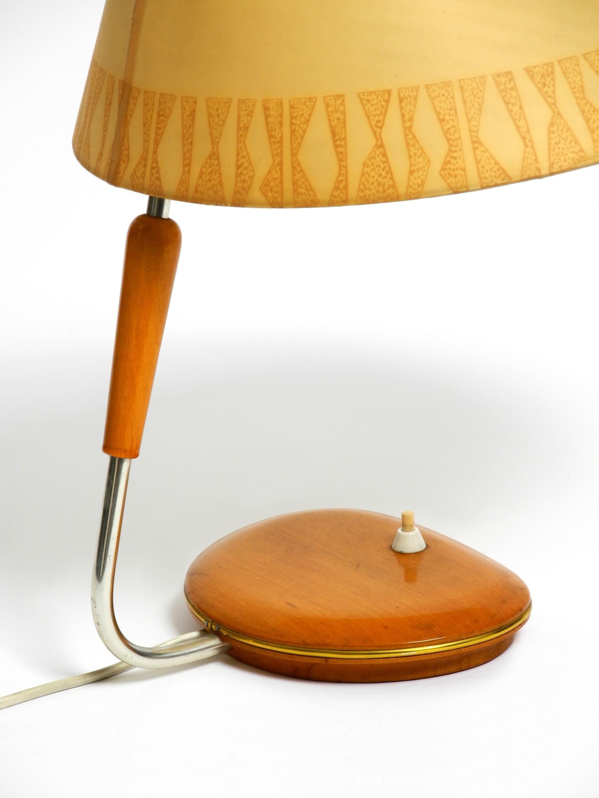 Mid-20th Century Mid Century wood and fabric shade table lamp from the DDR with stamp from 1966