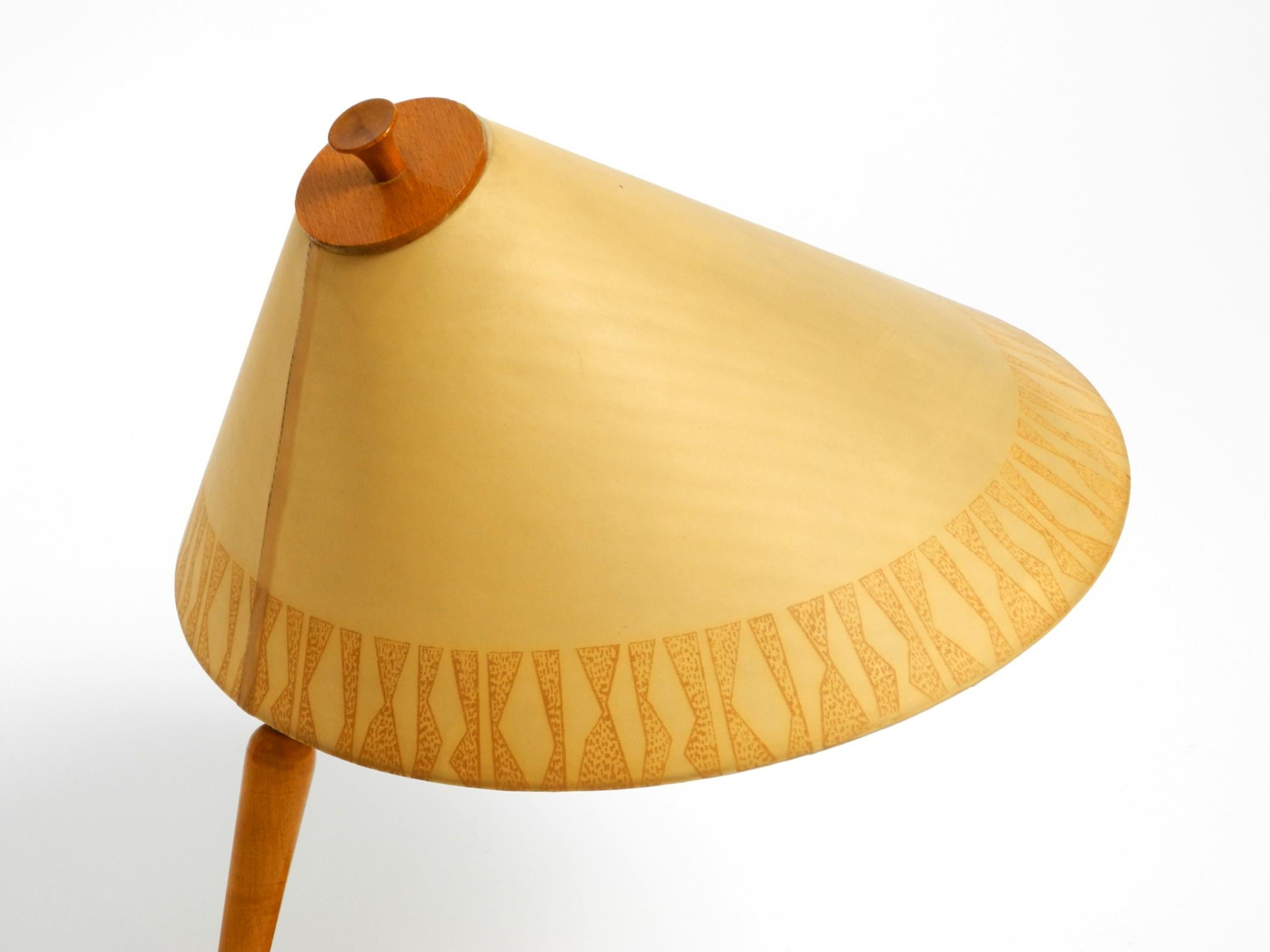 Metal Mid Century wood and fabric shade table lamp from the DDR with stamp from 1966