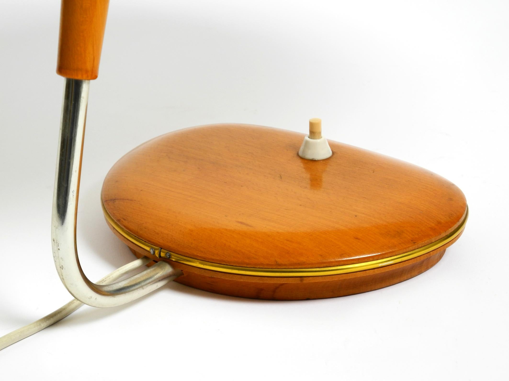 Mid Century wood and fabric shade table lamp from the DDR with stamp from 1966 1
