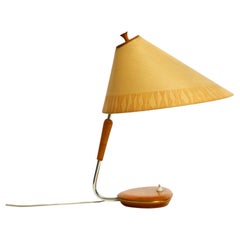 Mid Century wood and fabric shade table lamp from the DDR with stamp from 1966