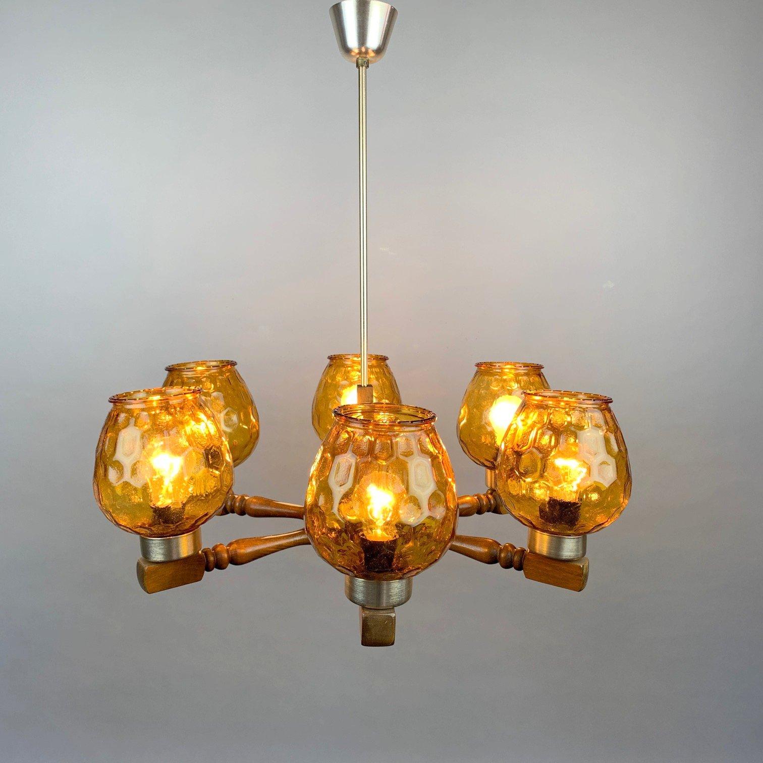 Vintage six-arm wooden chandelier from the 1970's. Made in former Czechoslovakia. 
Original wiring, fully functional. 
Bulbs: 1 x E27 or E26.