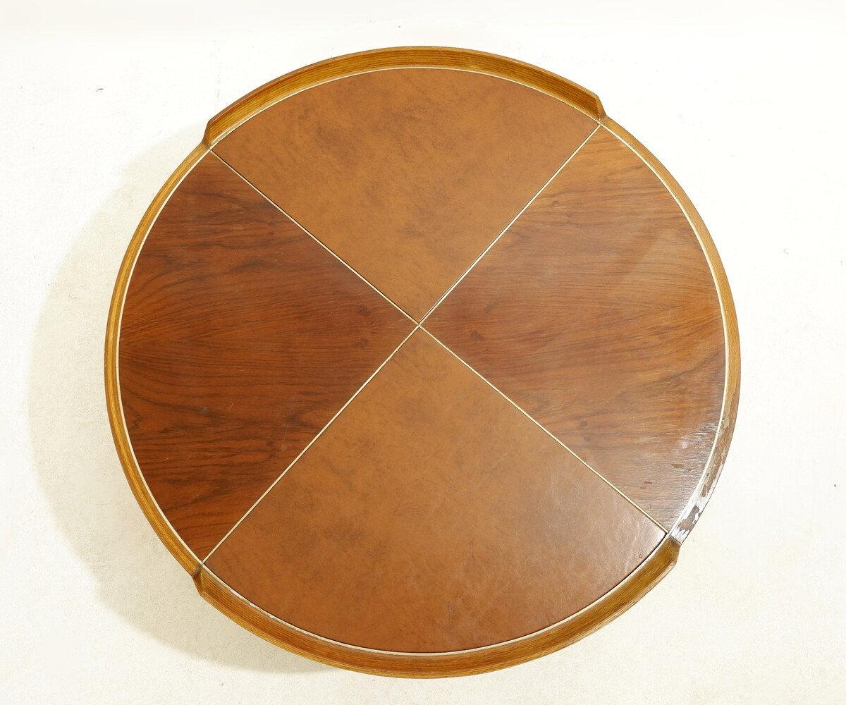 Couchtisch aus Holz und Leder aus der Mitte des Jahrhunderts
Couchtisch aus Holz und Leder
Maße: Ø91cm H:35cm 
MATERIALIEN : Holz - Leder 
Abnutzung Entsprechend dem Alter und dem Gebrauch

