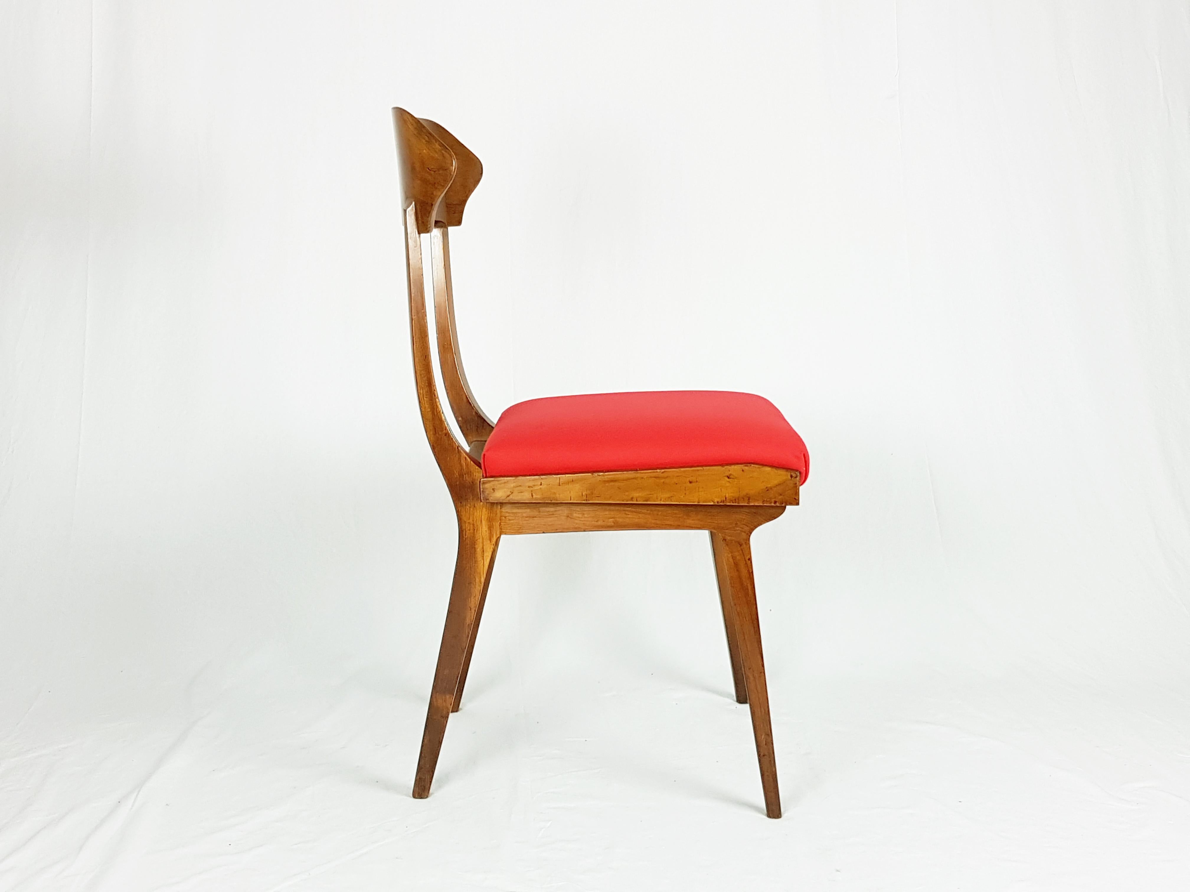 Pair of wooden and red fabric chairs manufactured by Fratelli Barni from Seveso (Milan) in 1950s. Very good condition: chairs have been partially restored and reupholstered. Manufacture label beneath the seat.