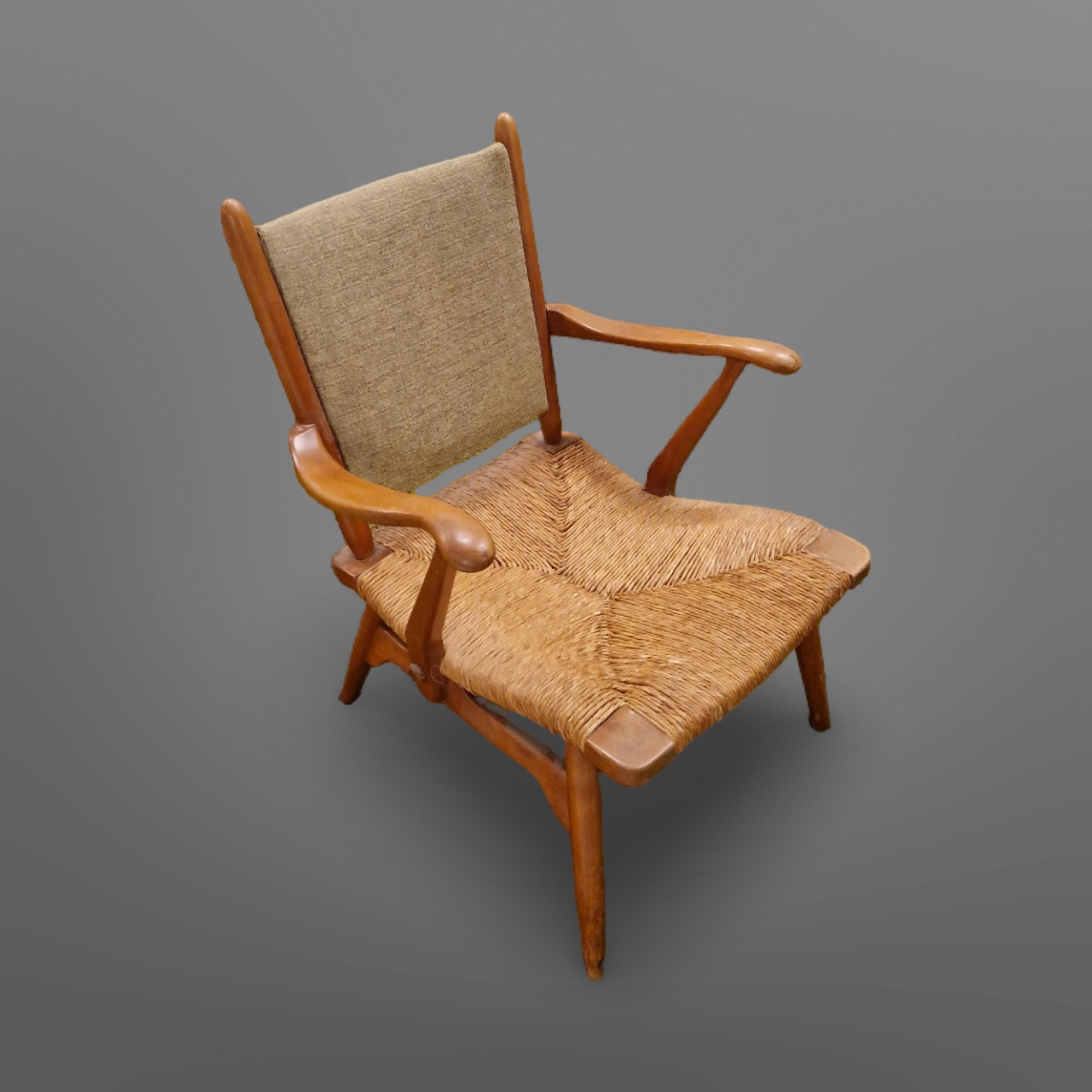 Hand-Woven Mid century wood and rush lounge chair by de Ster Gelderland, Netherlands 1950s