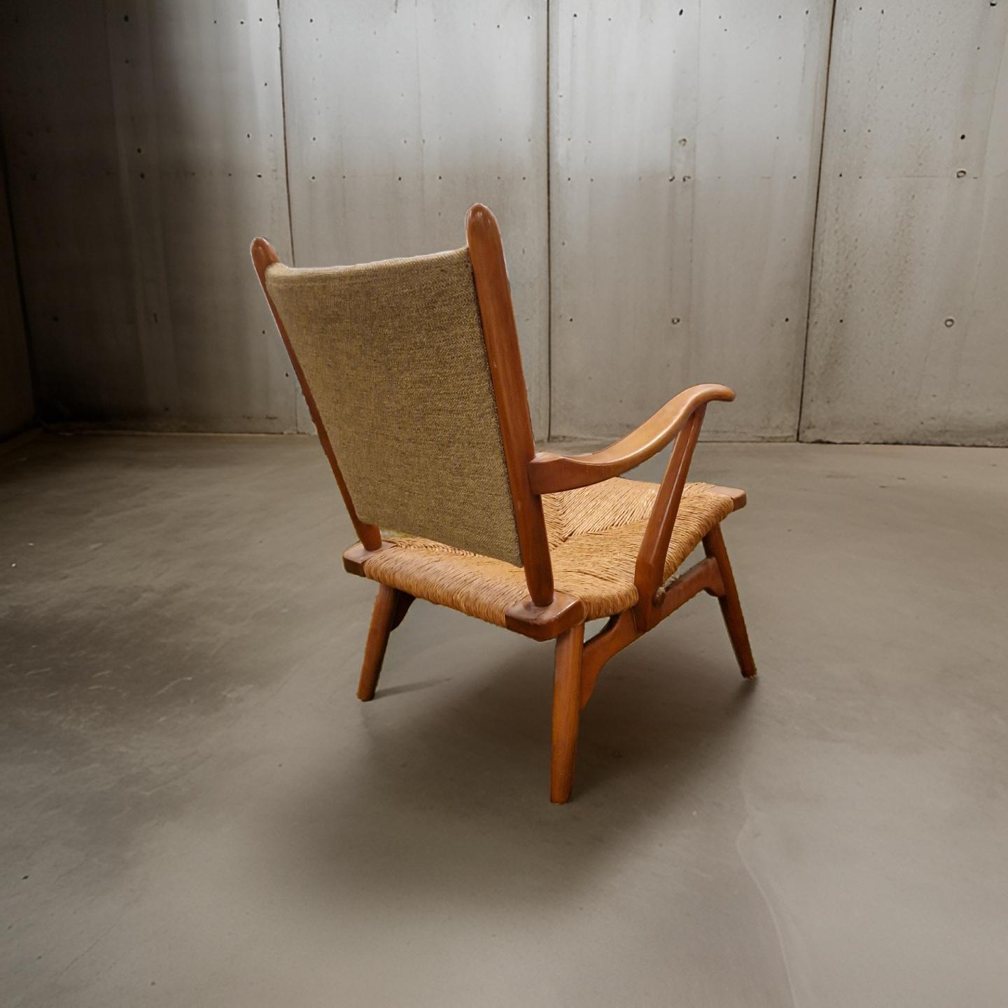 20th Century Mid century wood and rush lounge chair by de Ster Gelderland, Netherlands 1950s