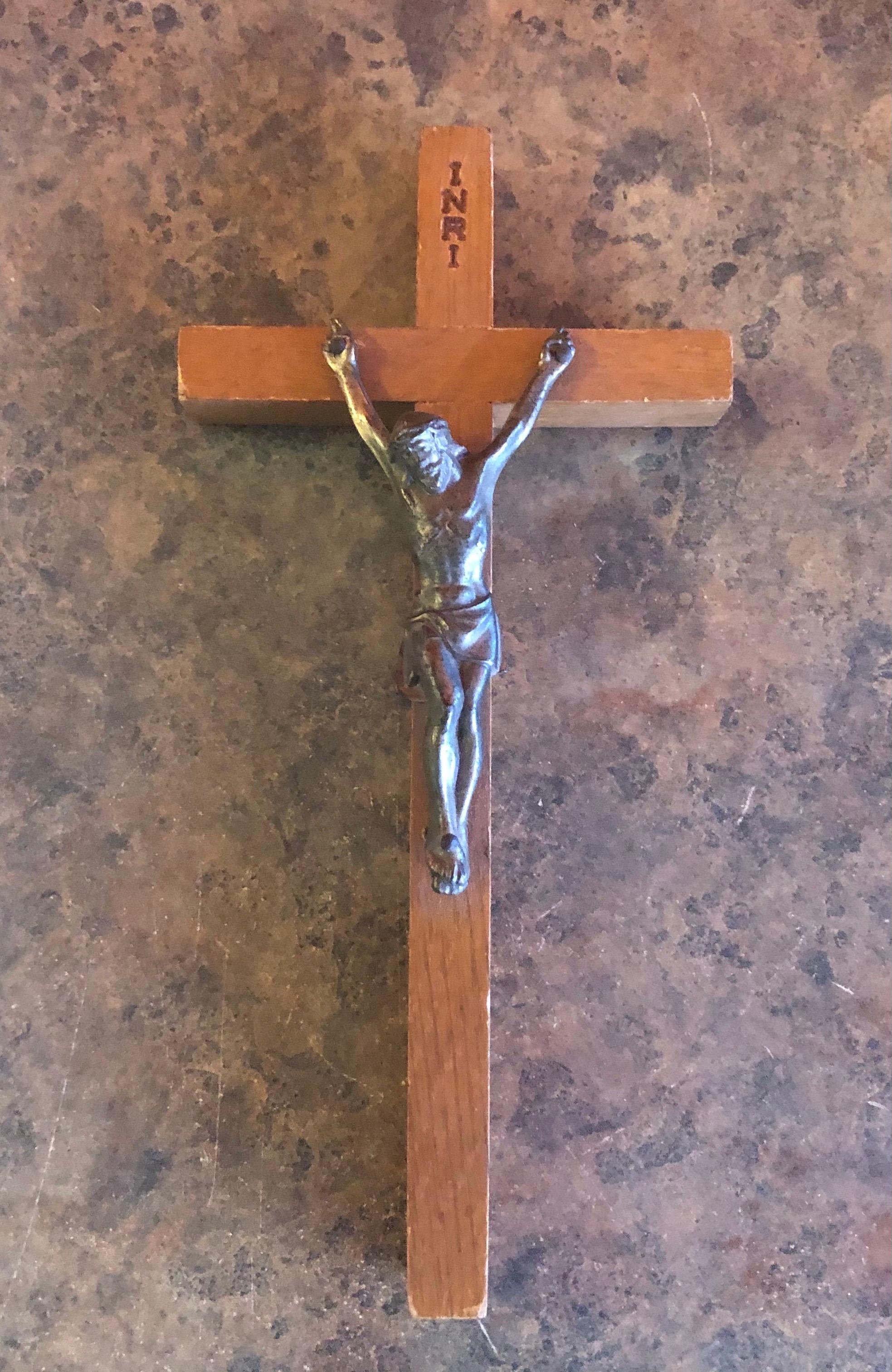 A very nice midcentury wood crucifix with a brass Jesus on the cross, circa 1970s. Nice detail and patina. #1285.