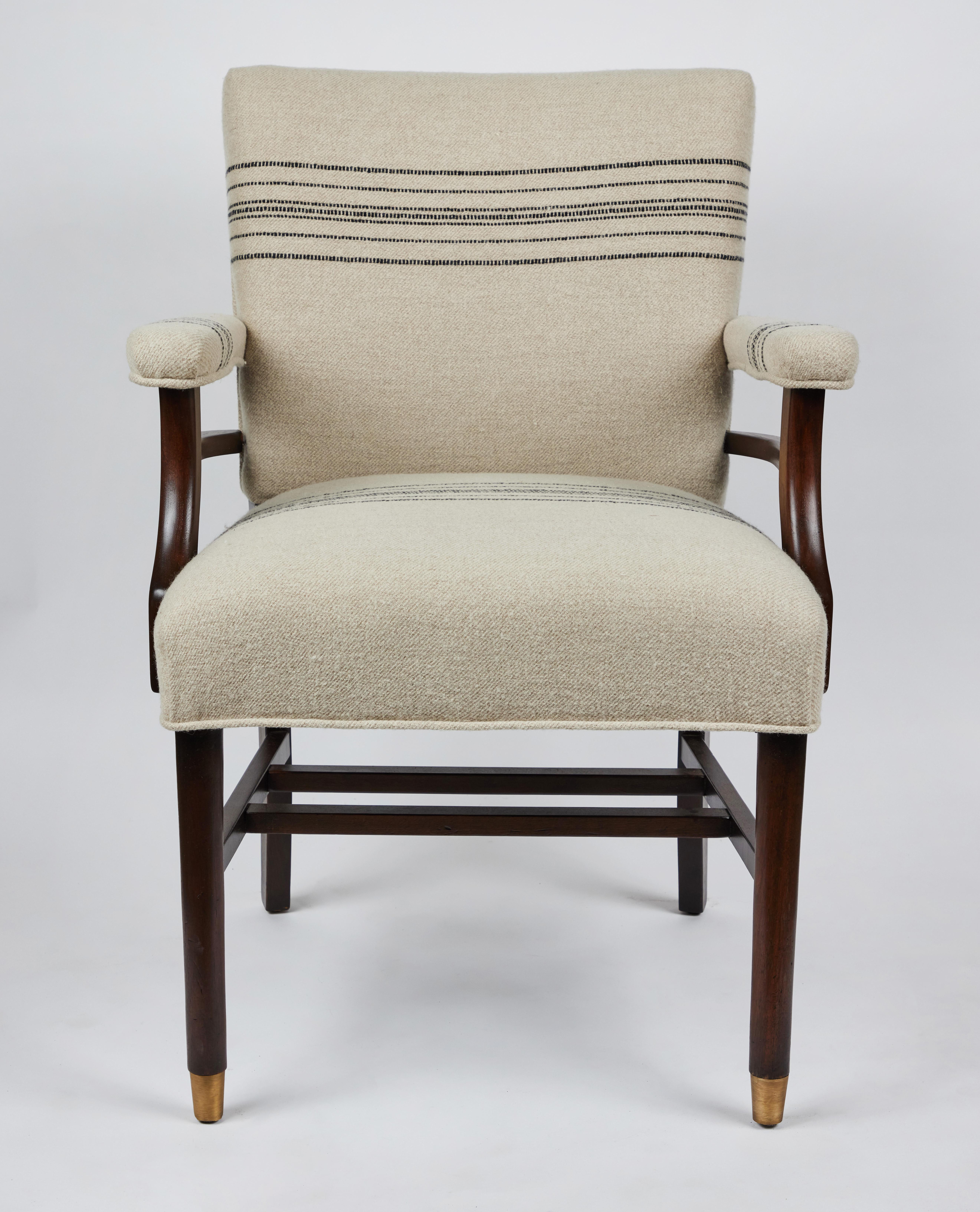 Mid century wood framed arm chairs newly upholstered in a wool & linen fabric from Belgium.
