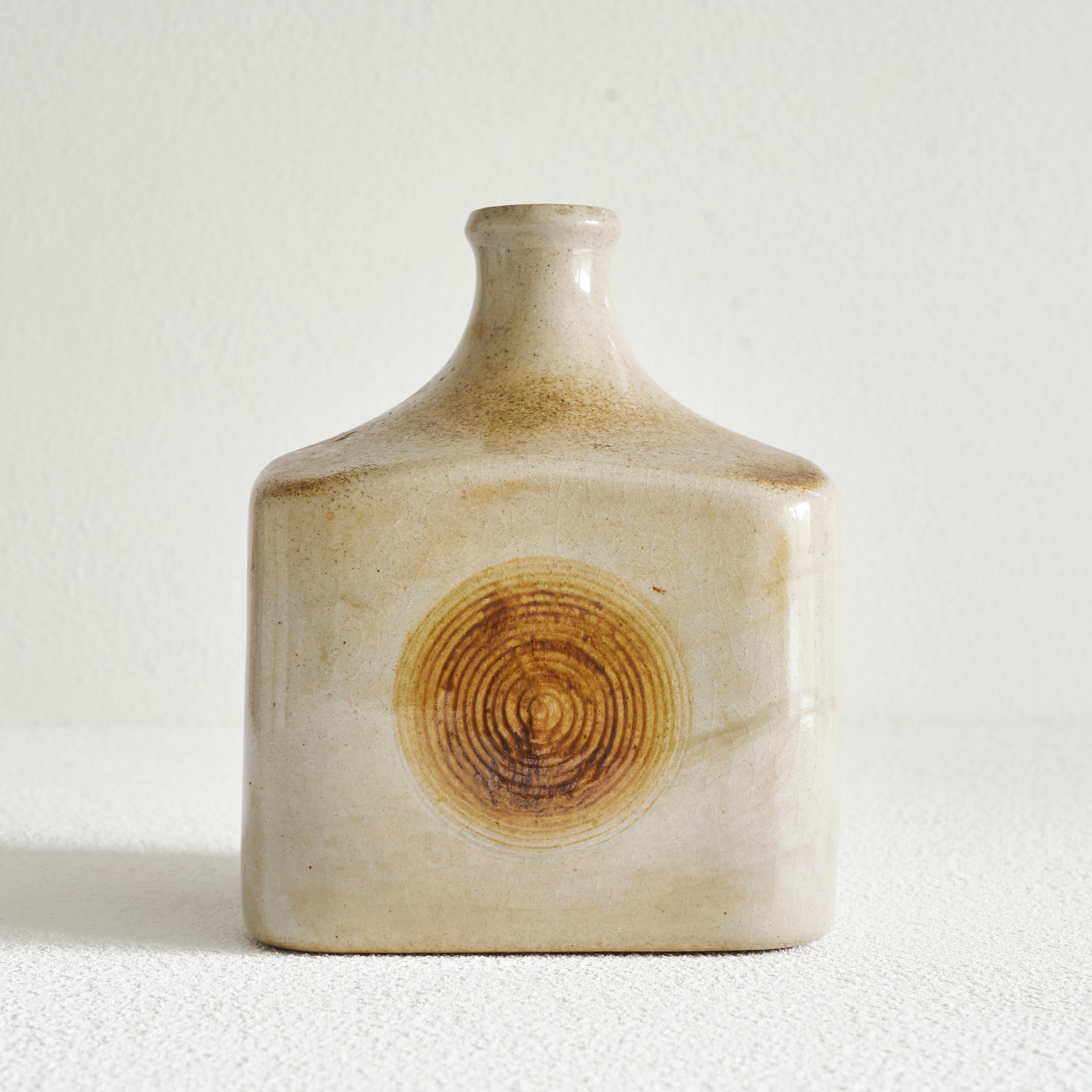 Studio pottery vase with ‘wood imprint’, Mid 20th century. 

Wonderful and interesting studio pottery vase with a distinct ‘wood’ imprint of growth rings in the glaze on every side. A very interesting and elegant decor, combined with a very