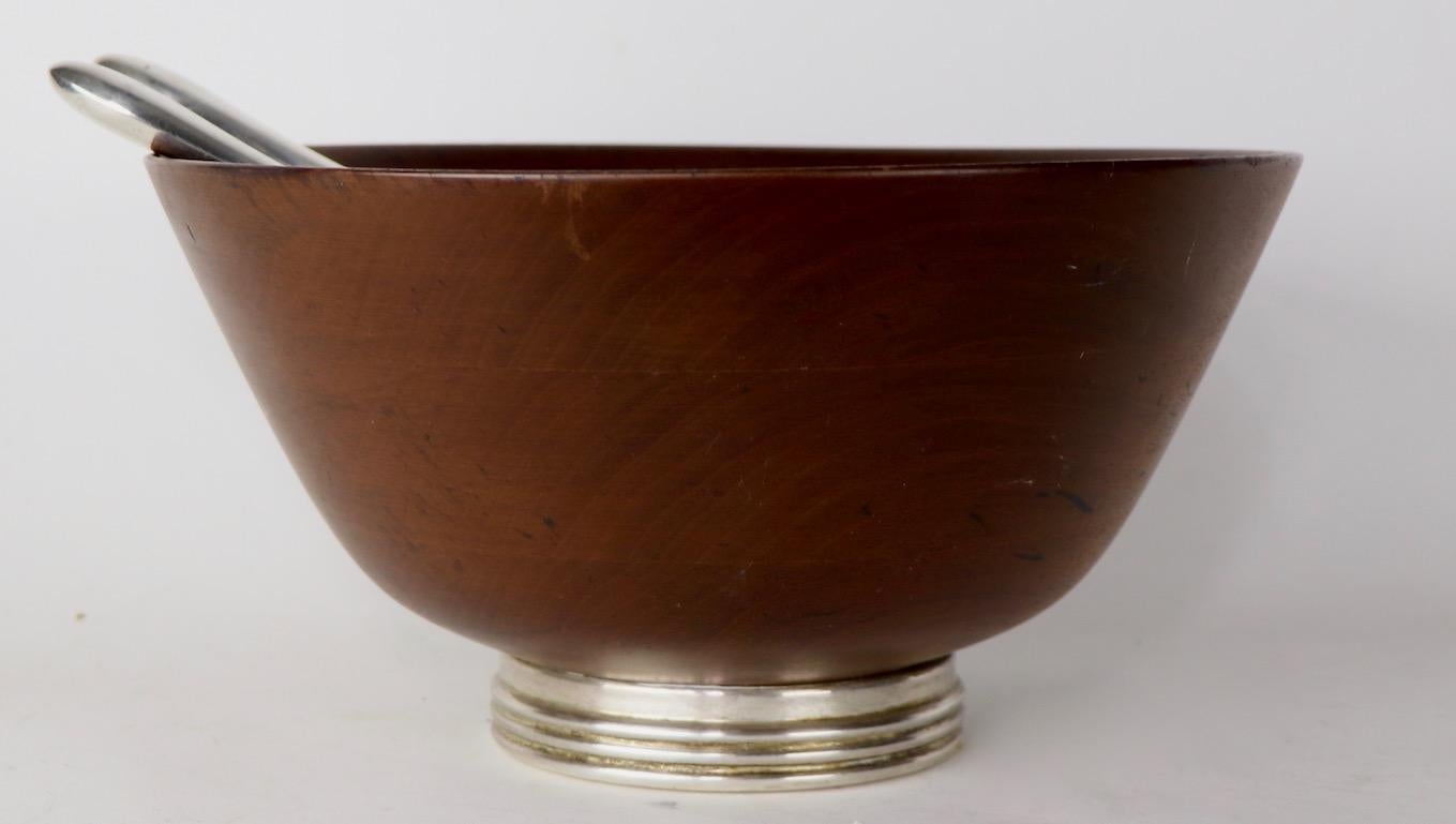 Stylish midcentury wood salad bowl, on sterling base, with matching serving spoon and fork. Very good, original condition.