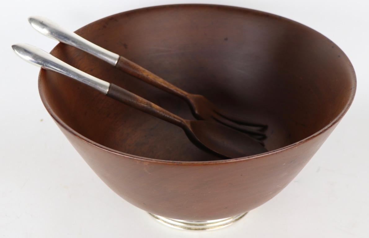 salad bowl with serving spoons