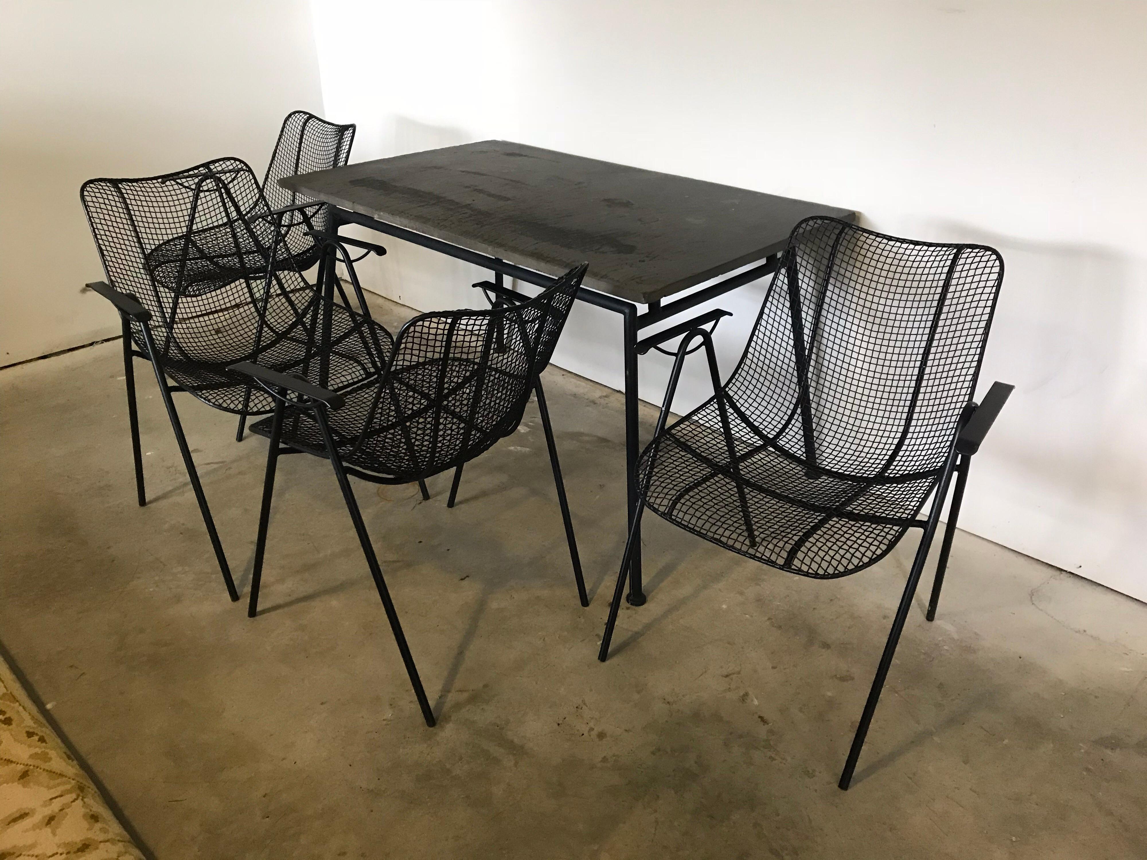 Mid Century Woodard Slate Top Patio Table with Four Wrought Iron Chairs, 1950s In Good Condition In Bedford Hills, NY