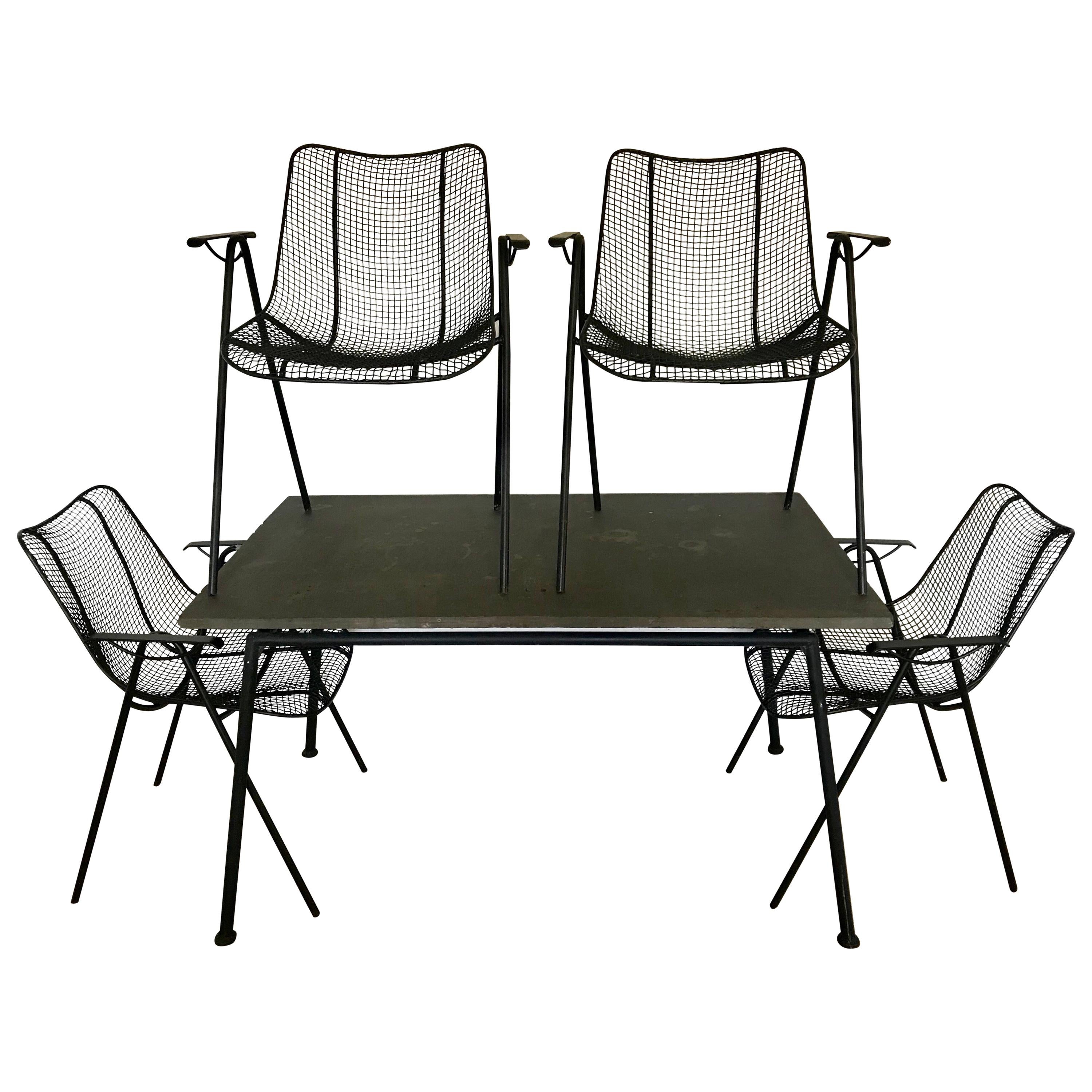 Mid Century Woodard Slate Top Patio Table with Four Wrought Iron Chairs, 1950s