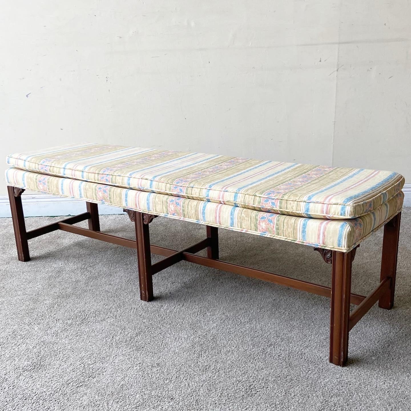 Exceptional mid century wooden bench. Possibly by Henredon. It was acquired with a matching piece by Henredon. Features a floral fabric.