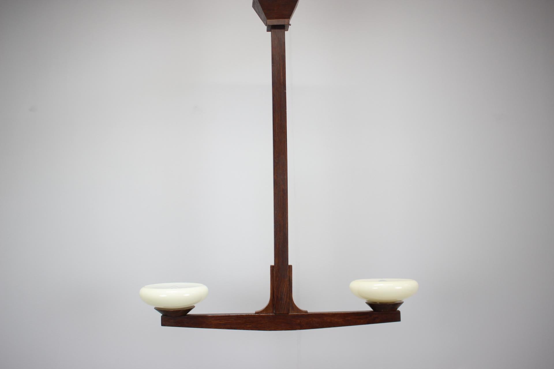 - Mid-century Wooden Chandelier, 1930s,
- made of wood and glass,
- shows signs of wear and age (scratches, etc.),
- in good original condition,