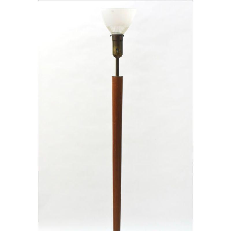 Mid Century Wooden Floor Lamp. Square wooden base and round stem which tapers from it's widest point at the top to its narrowest point at the bottom. Original wood finish in good condition, some wear and a crack in the wooden base. Newly rewired,