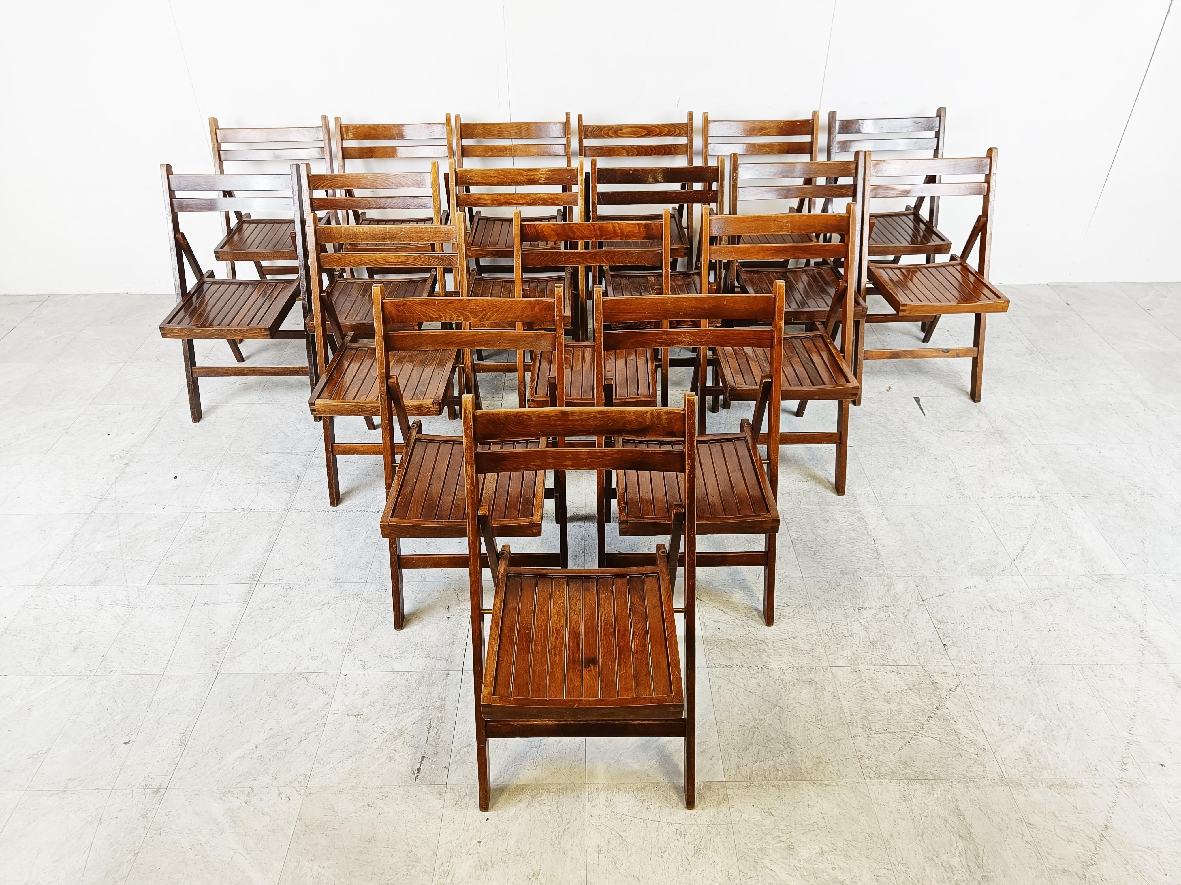 Midcentury wooden folding chairs.

Simple yet elegant design and made in romania in the 1950s.

Beautiful age related wear/patina.

We have 18 pieces available, priced per piece.

Dimensions: 
Height: 81cm/31.88