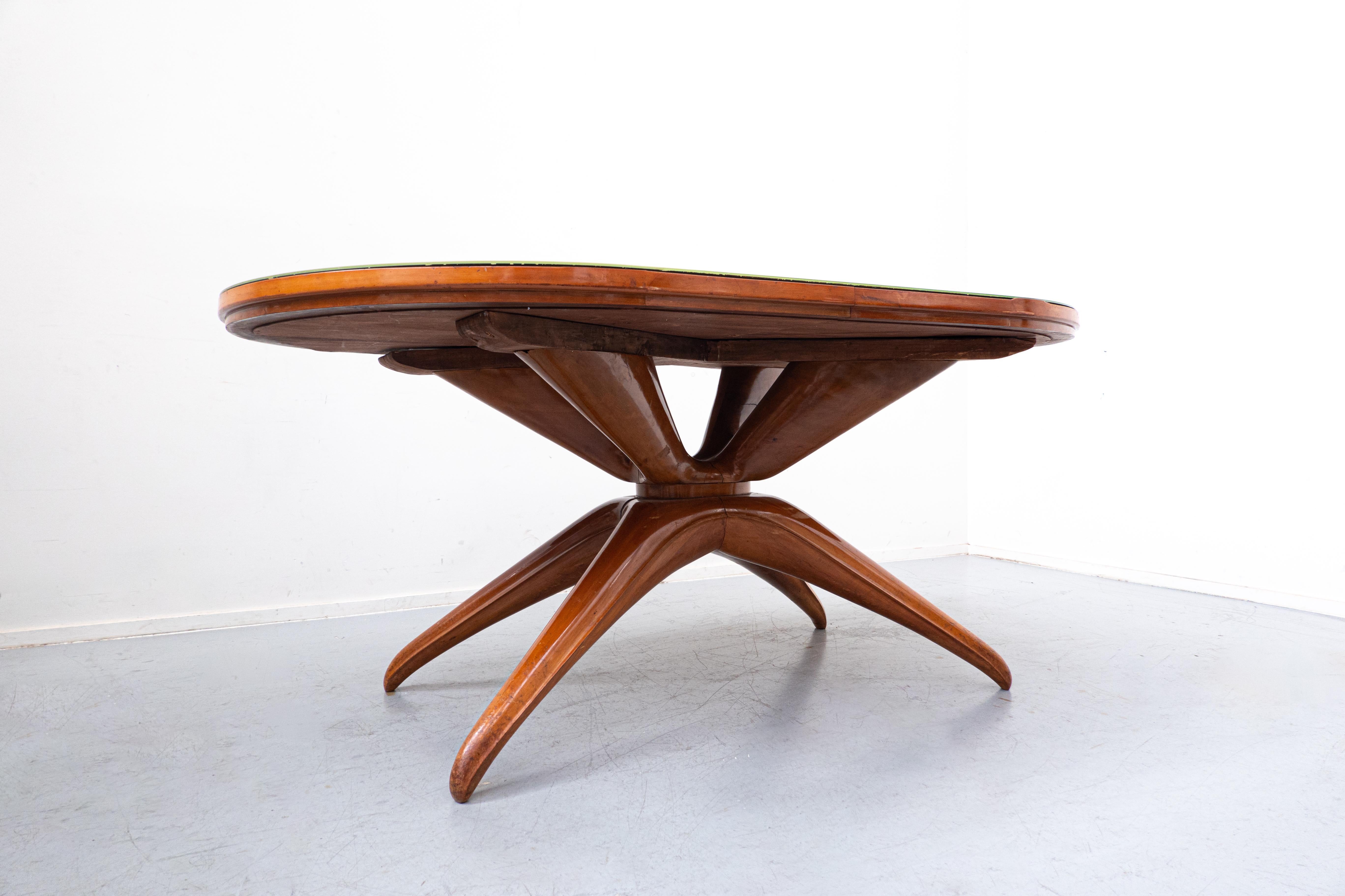 Mid-Century Guglielmo Ulrich brown wooden dining table, cherry wood and glass, Italy, 1950s.