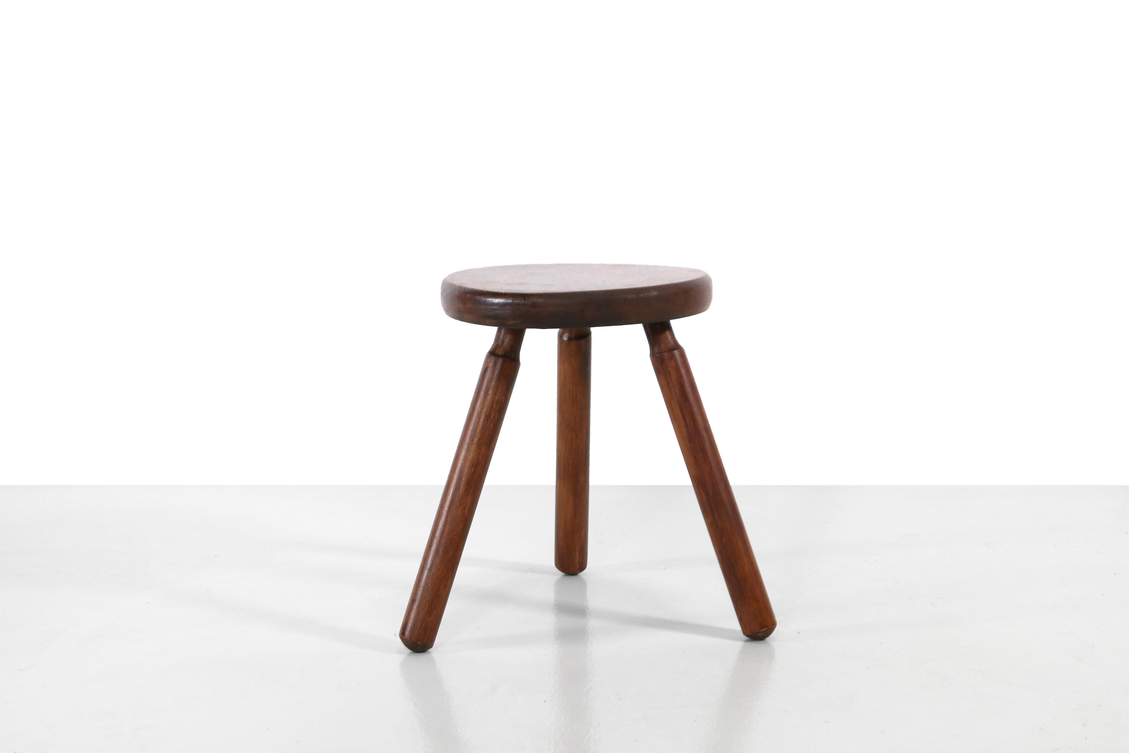 Nice mid-century wooden stool from the 1950s. Made of solid beech wood which is stained and is perfect to use as a side table or for example as plant table. The stool is 28 cm high and has a diameter of 21 cm.