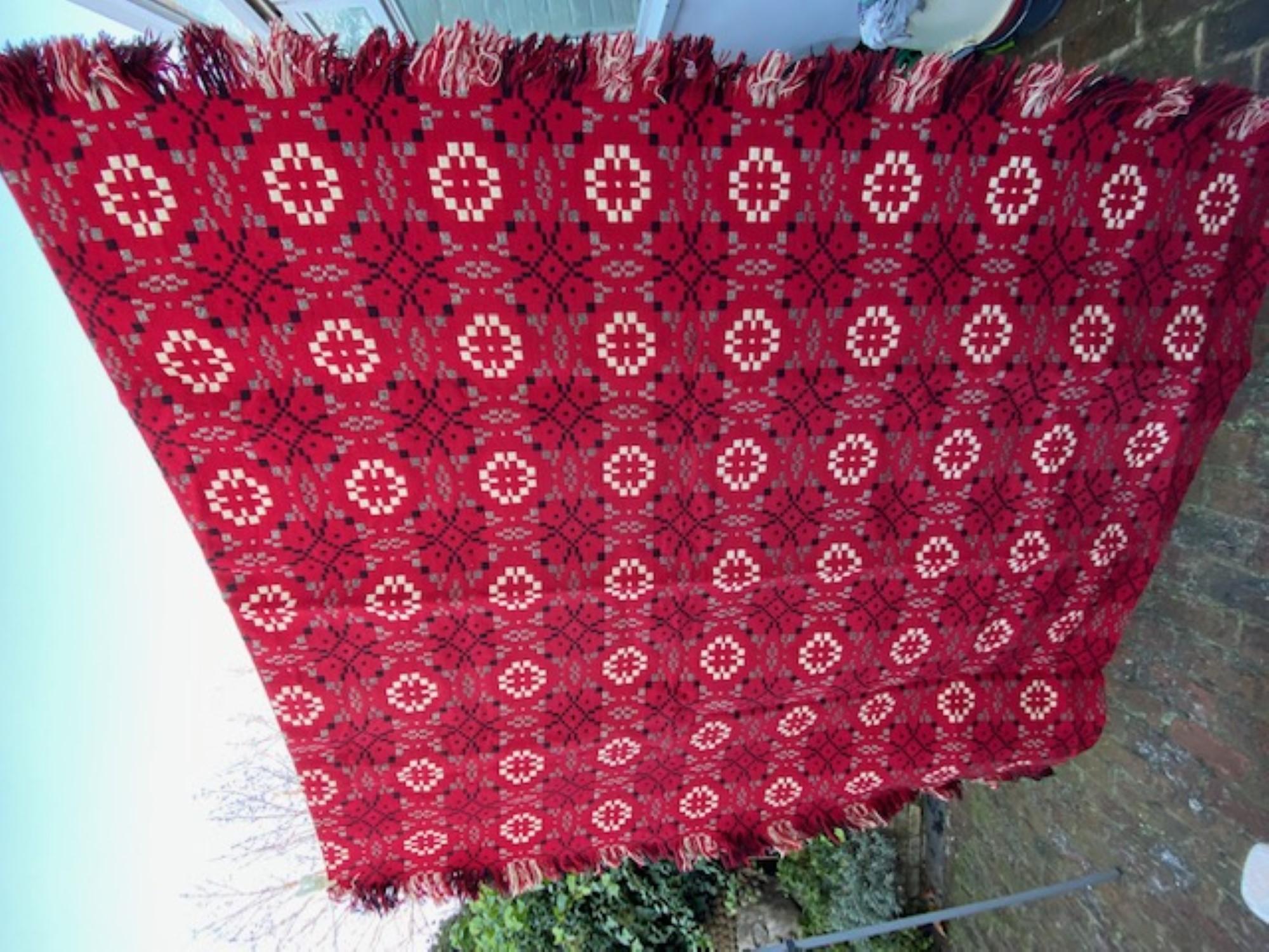 Mid-Century Wool Welsh Tapestry Blanket, 1970s (Red, Black & White)

Beautiful pure wool Welsh Tapestry Blanket in red, black and white colours.  
Reversible, fringed on two sides.  Strong colours, in as new condition.
This blanket has not been