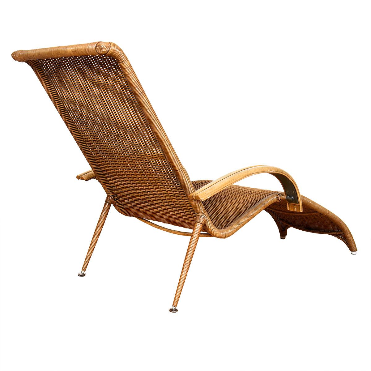 - This rattan chaise lounge makes a statement with its gorgeous profile.
- Sexy, dramatic and functional.
- Curvaceous bentwood arms.
- Splayed wooden back legs.
- Very high-quality chaise built to last and with comfort in mind.
- Old-school steel
