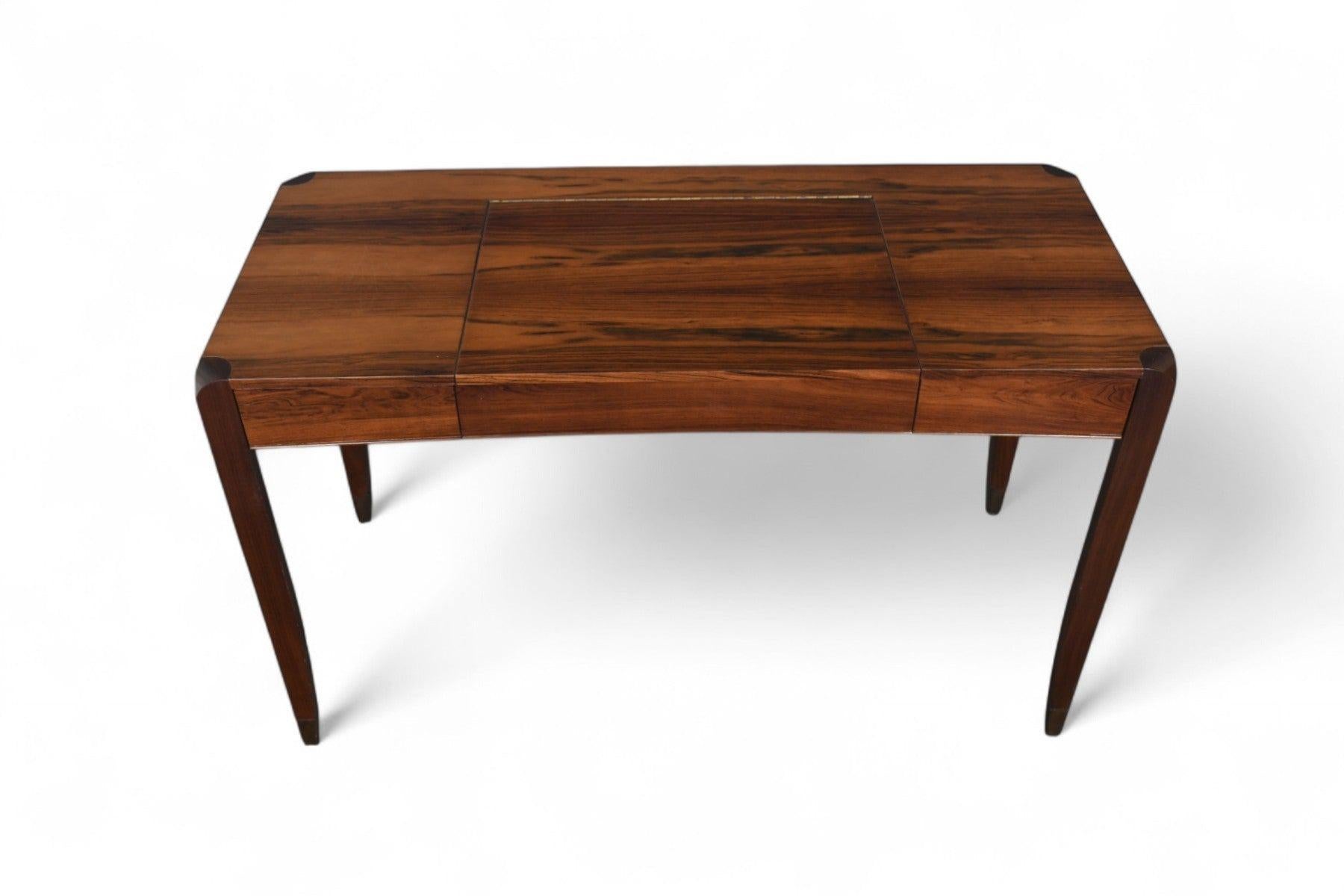 Origin: Denmark
Designer: Unknown
Manufacturer: Unknown
Era: 1960s
Materials: Rosewood, Beech
Measurements: 49.25