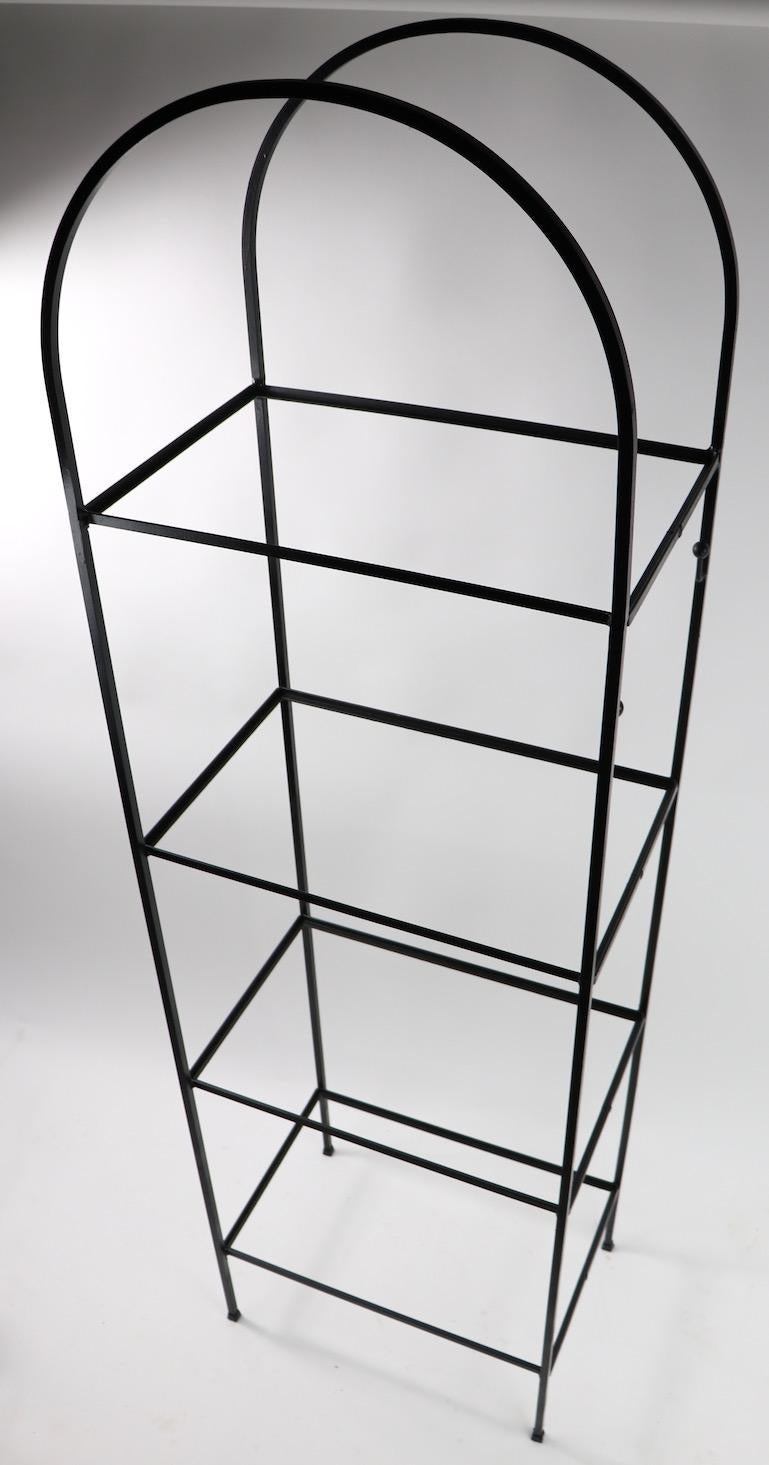 wrought iron and glass shelves