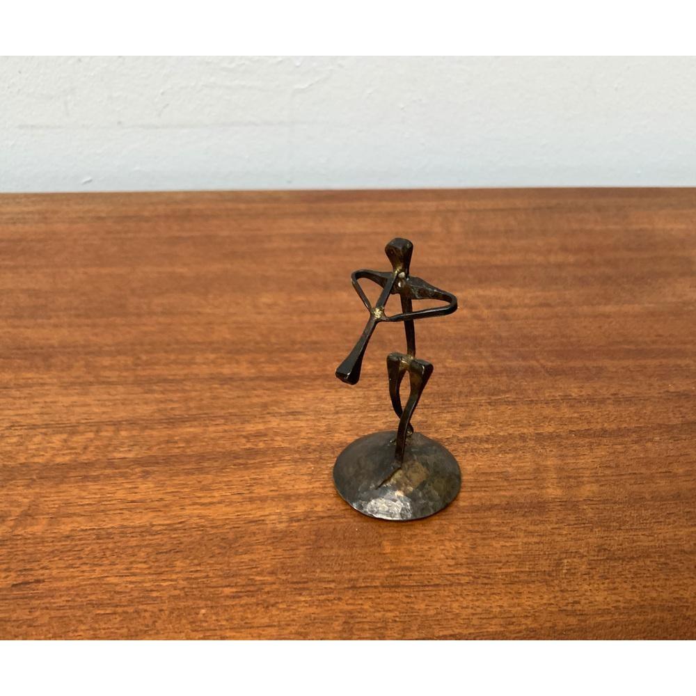 Mid-Century moderno Figurina di pifferaio in ferro battuto del 1960, ferro di cavallo, 1960 in vendita
