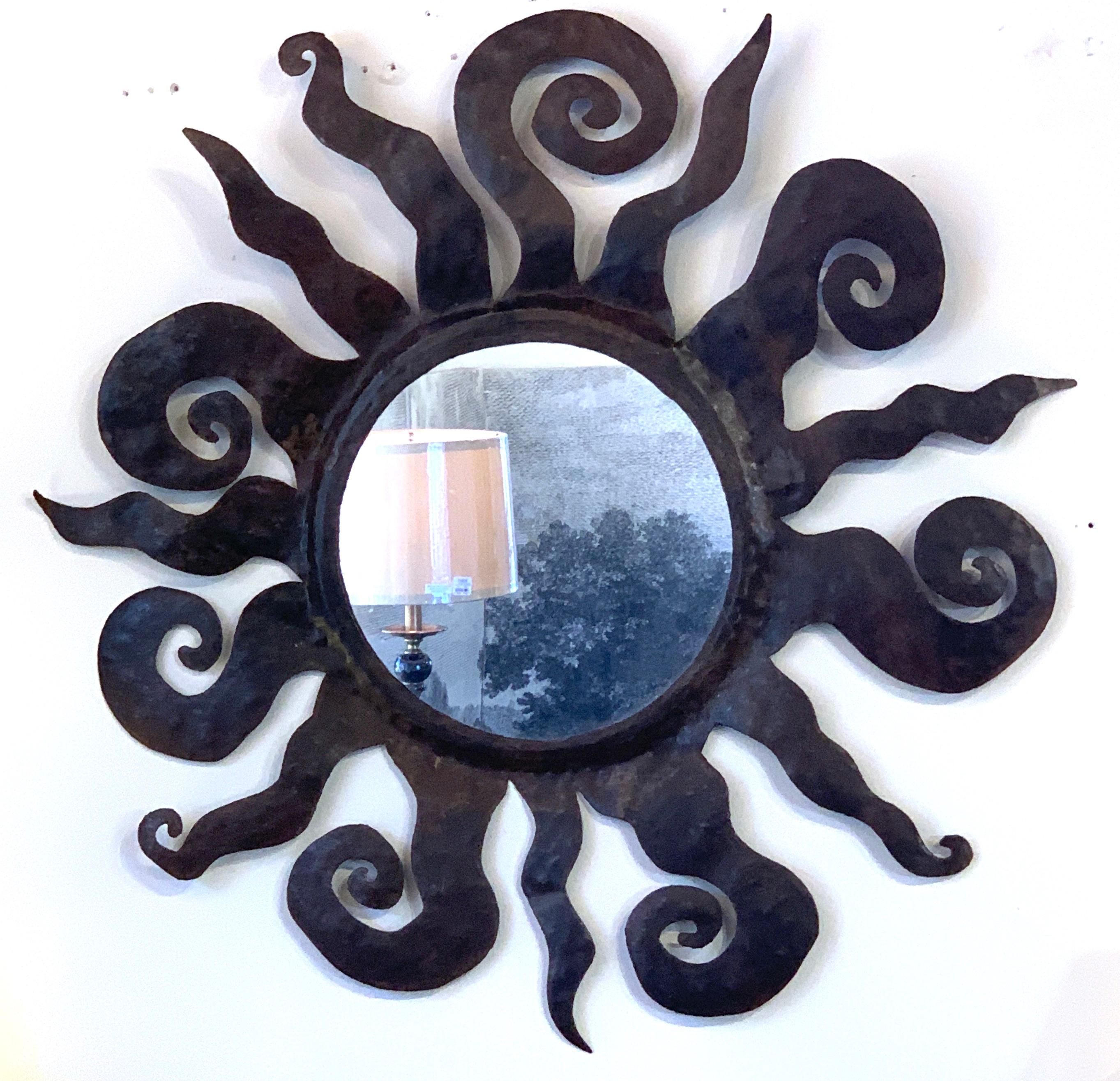 Midcentury wrought iron sunburst mirror attributed to Sergio Bustamante
11