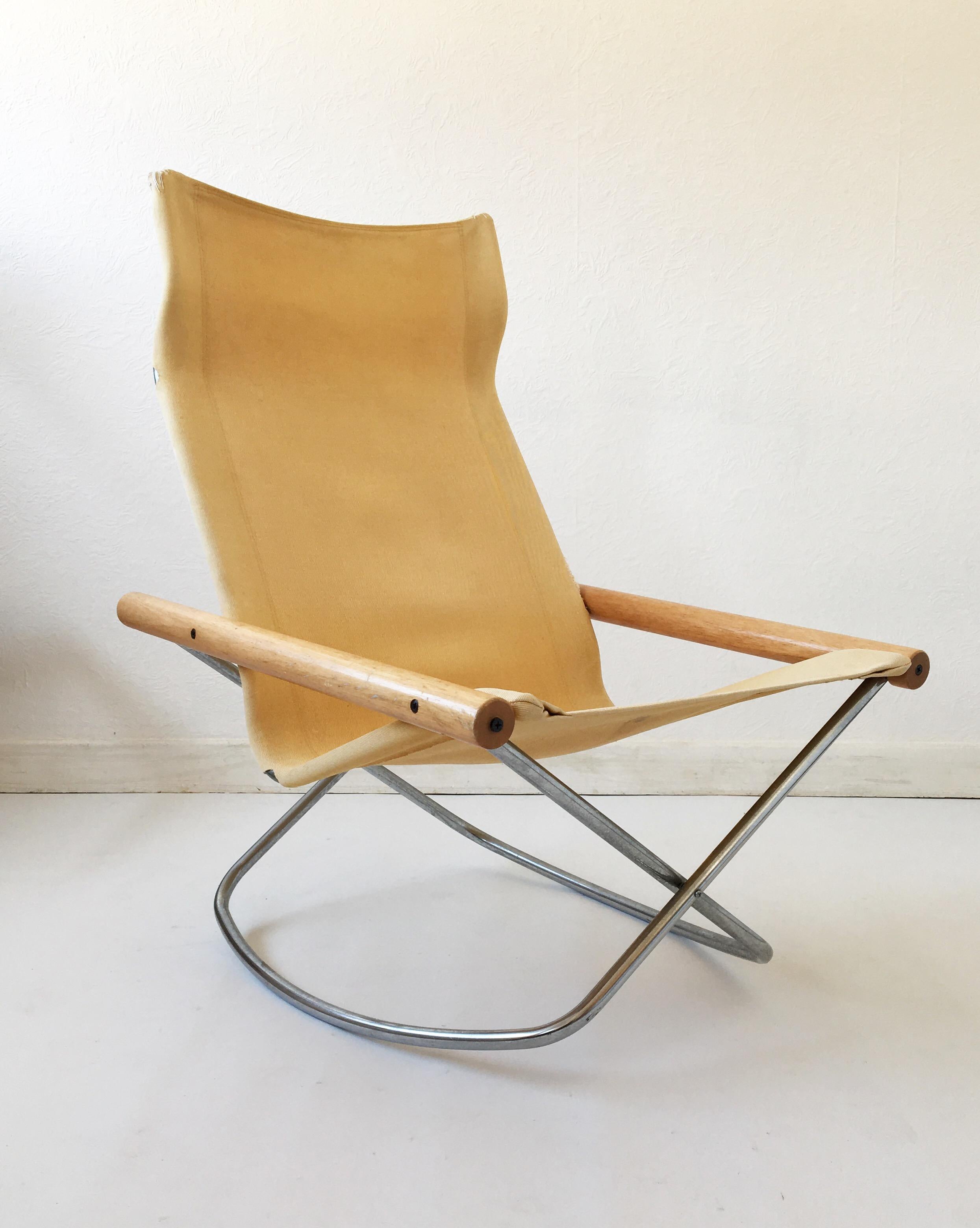 Two folding and rocking chairs designed by Japanese designer Takeshi Nii in 1958 and produced by Jox Interni, Italy. The chair was named 'NY' after the designer's family name, meaning 'new' in Danish. It has won many awards and became a permanent